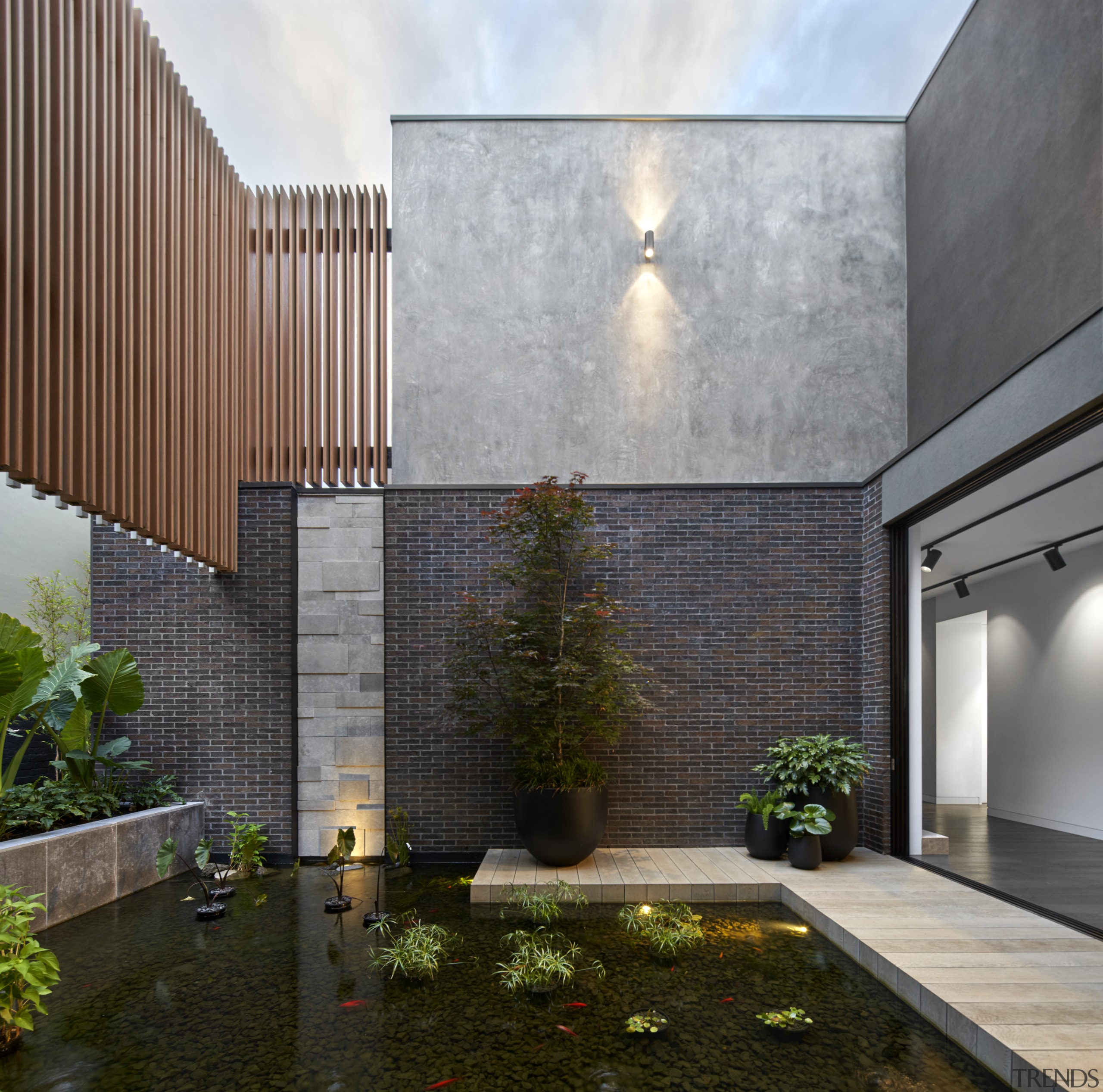 A central internal pond brings nature into the 