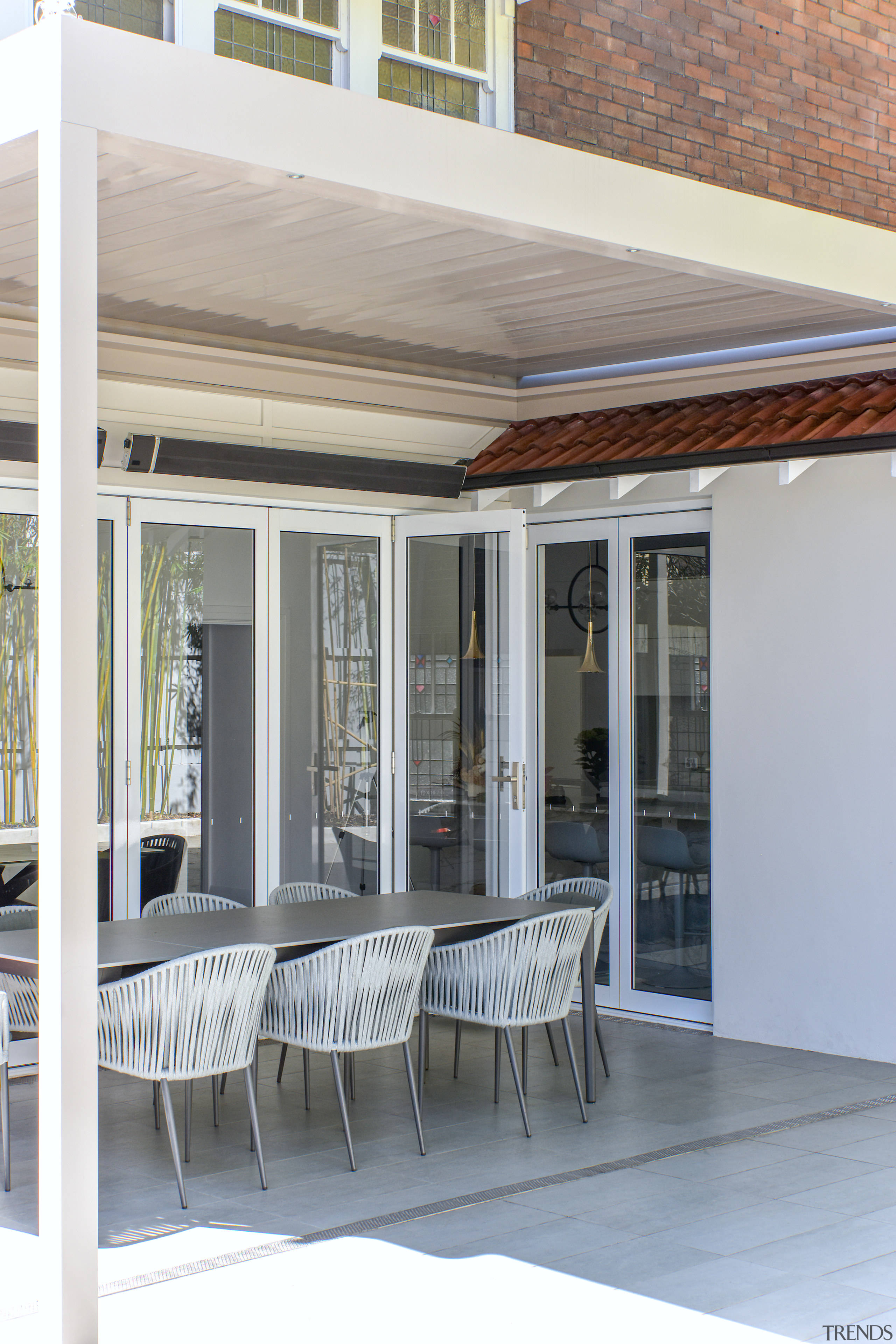 The new kitchen looks out on the sheltered 