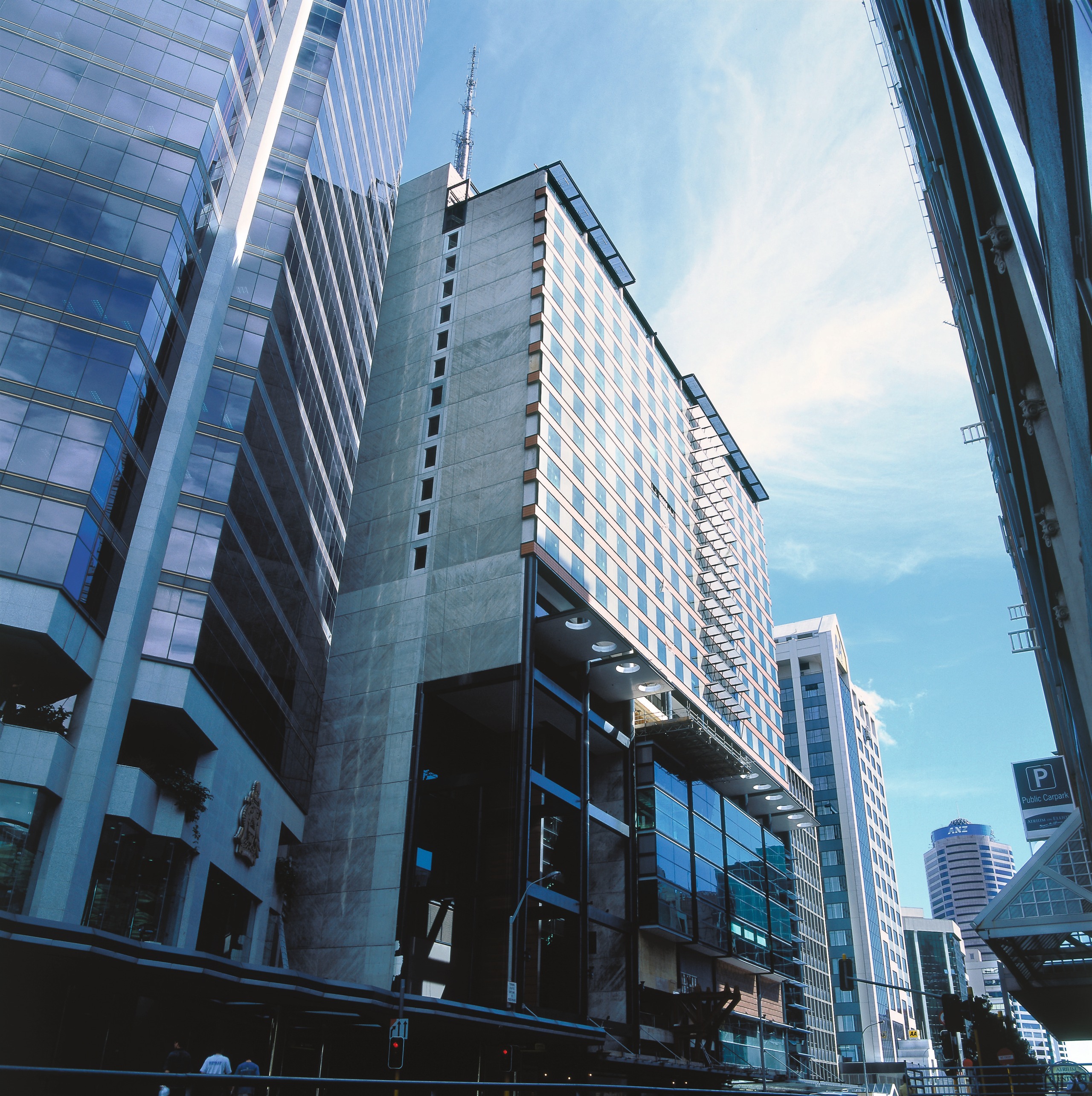 Exterior view of Sky City Convention centre showing architecture, building, city, cityscape, commercial building, condominium, corporate headquarters, daytime, downtown, facade, headquarters, metropolis, metropolitan area, mixed use, reflection, sky, skyline, skyscraper, tower block, urban area, window, teal, black