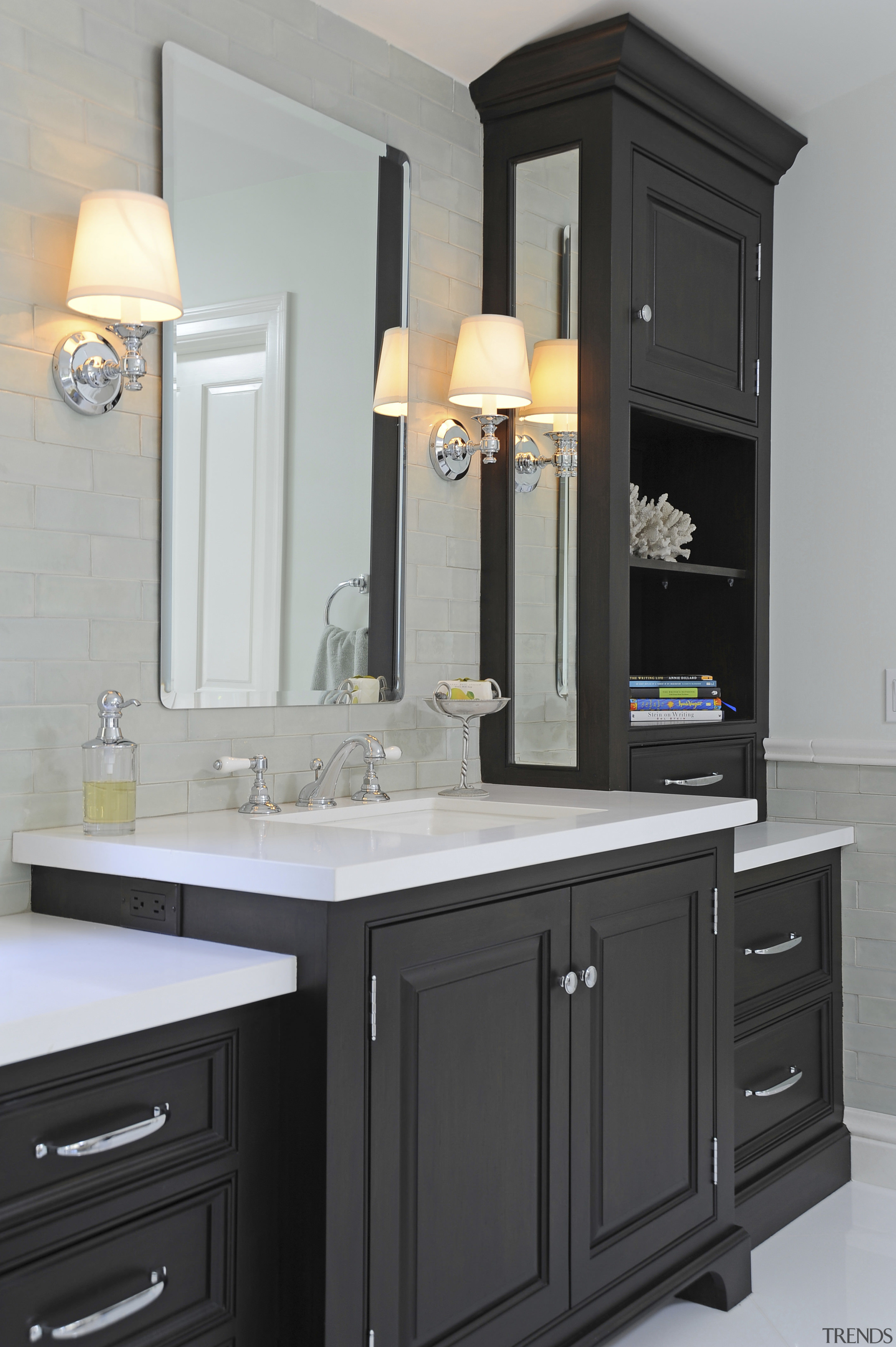 The 14ft-long double vanity has hard-wearing counters and bathroom, bathroom accessory, bathroom cabinet, cabinetry, chest of drawers, countertop, cuisine classique, furniture, home appliance, interior design, kitchen, kitchen stove, room, sink, gray, black