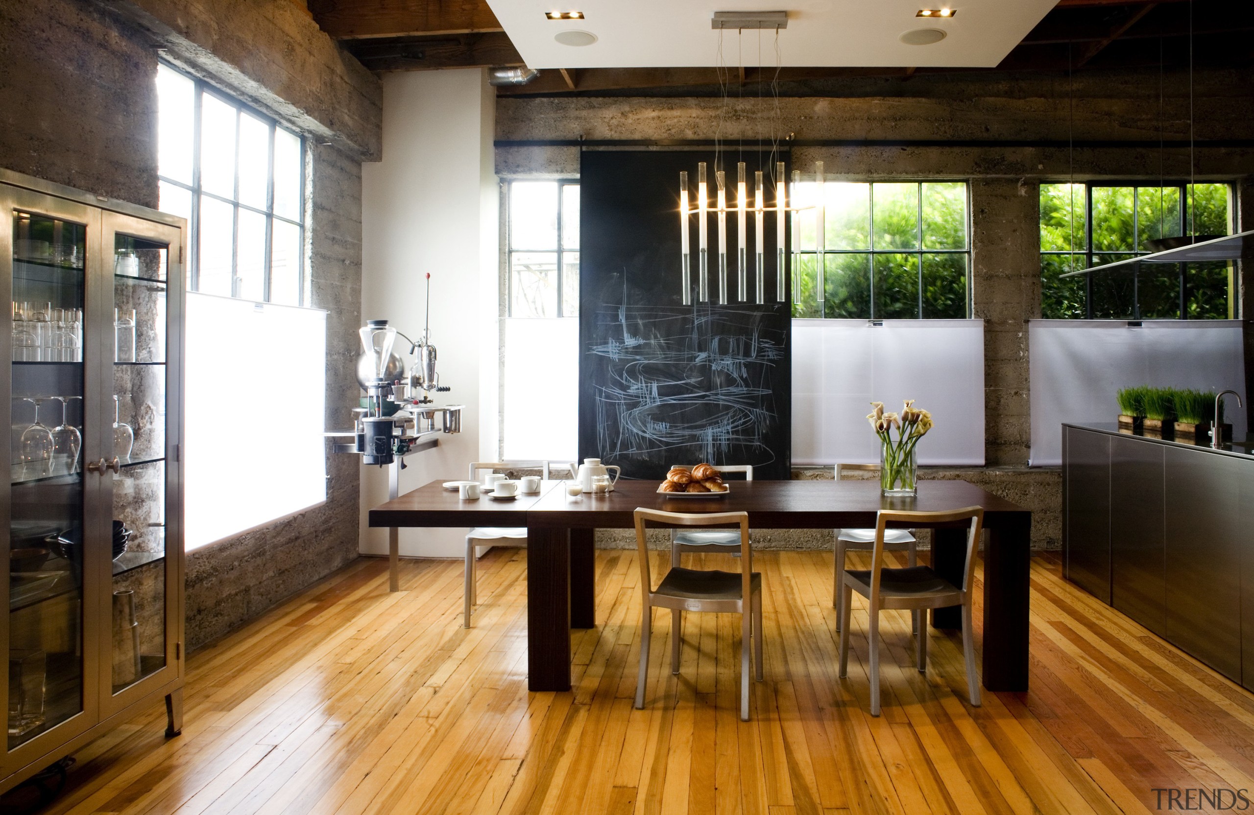 View of dining area which features slender dining dining room, floor, flooring, hardwood, interior design, loft, table, wood, wood flooring, brown