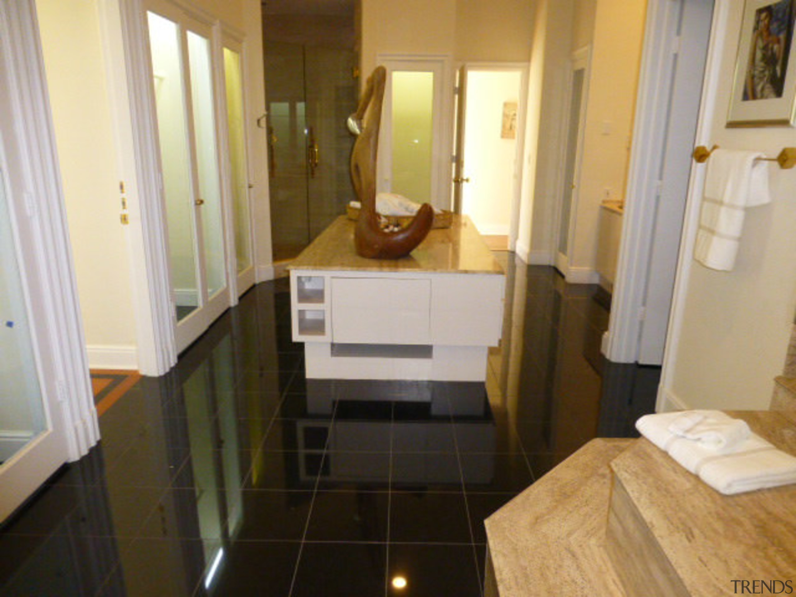 Prior to its substantial remodel, this bathroom had bathroom, cabinetry, countertop, floor, flooring, furniture, hardwood, home, house, interior design, kitchen, property, real estate, room, tile, window, wood flooring, brown, gray