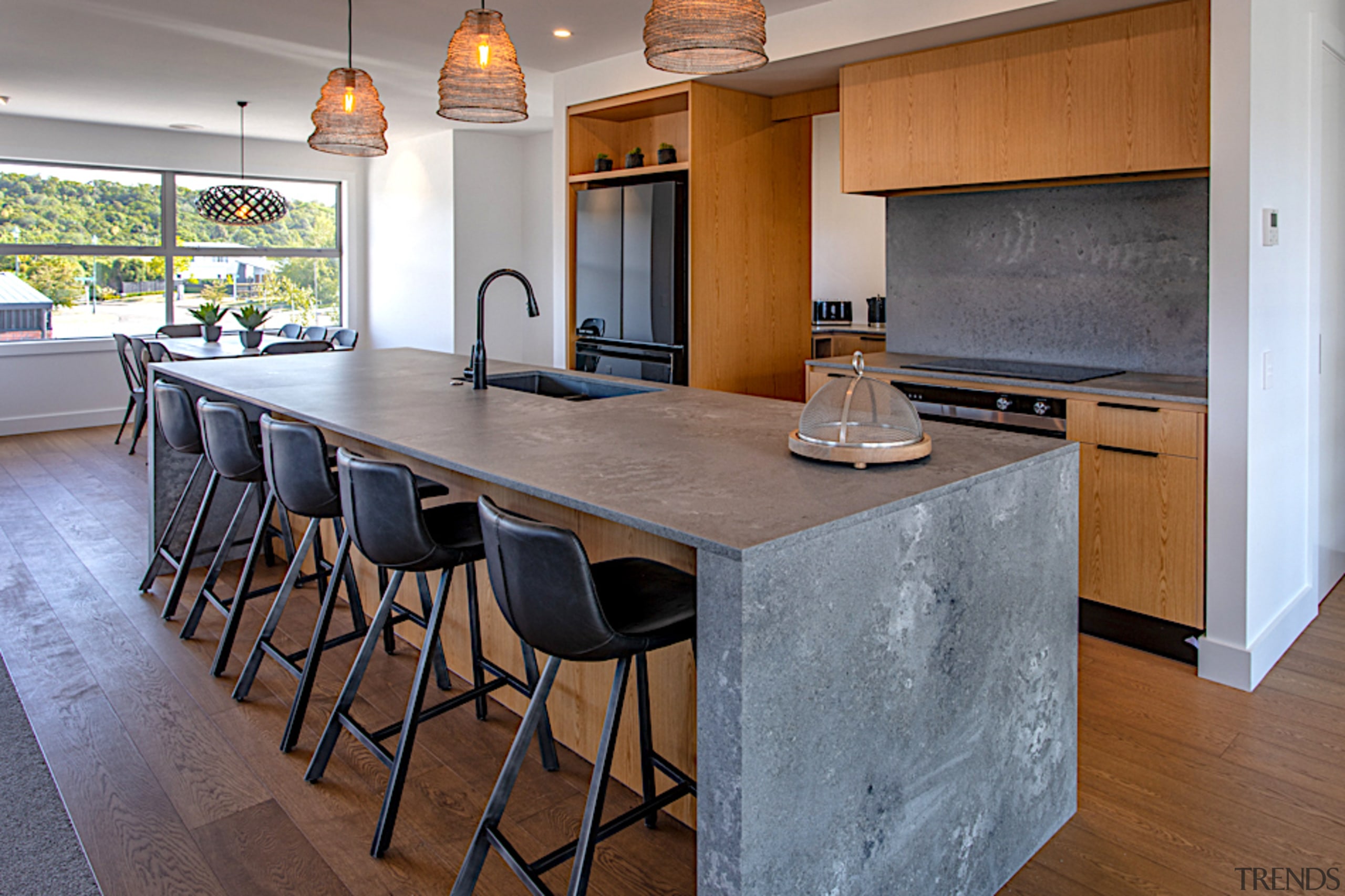 The look of wood meets the look of architecture, bar stool, building, cabinetry, countertop, design, dining room, floor, flooring, furniture, granite, hardwood, home, house, interior design, kitchen, property, real estate, room, stool, table, wood, wood flooring, wood stain, gray, brown