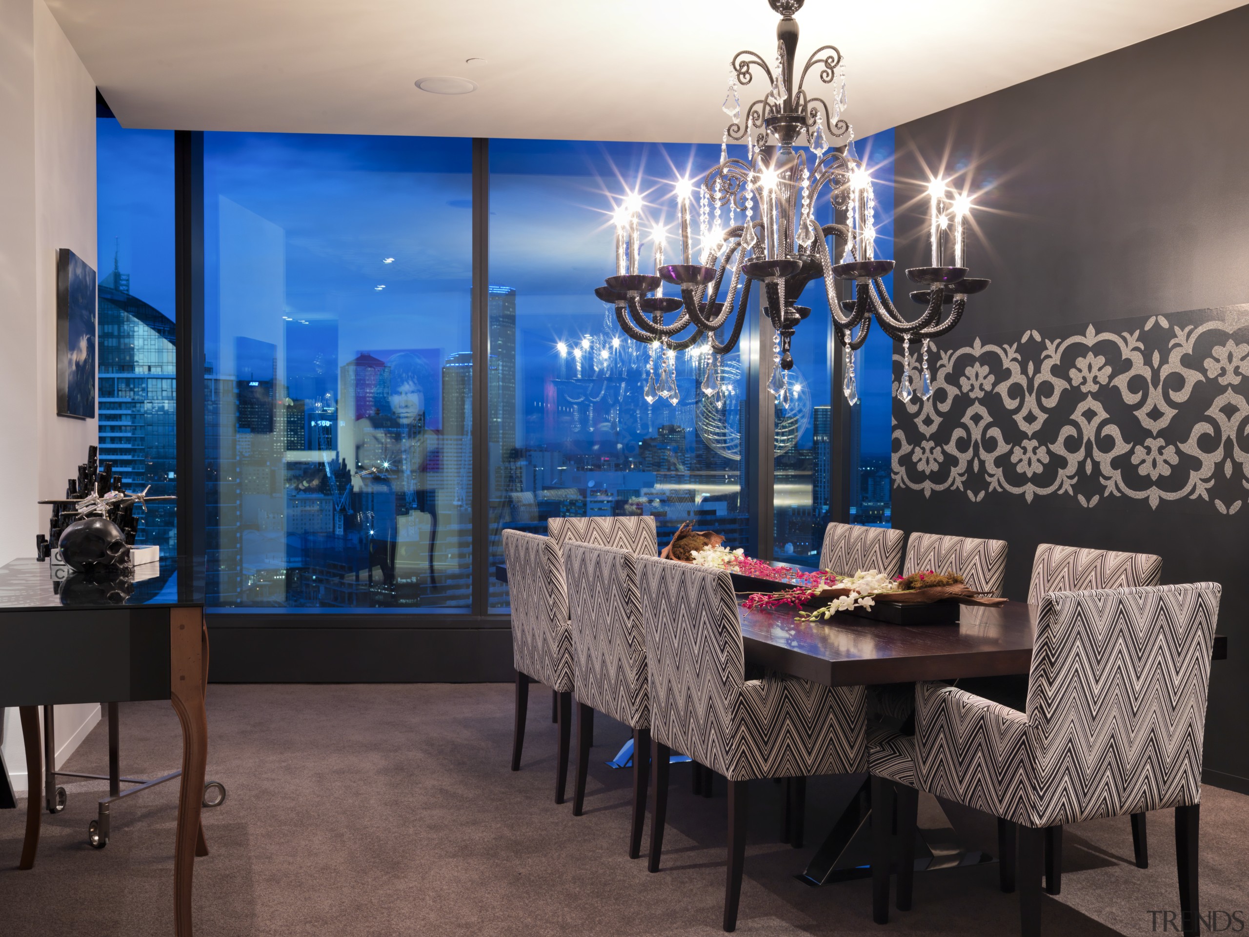 View of dining area which features a dining ceiling, dining room, interior design, living room, restaurant, room, table, wall, window, gray, black