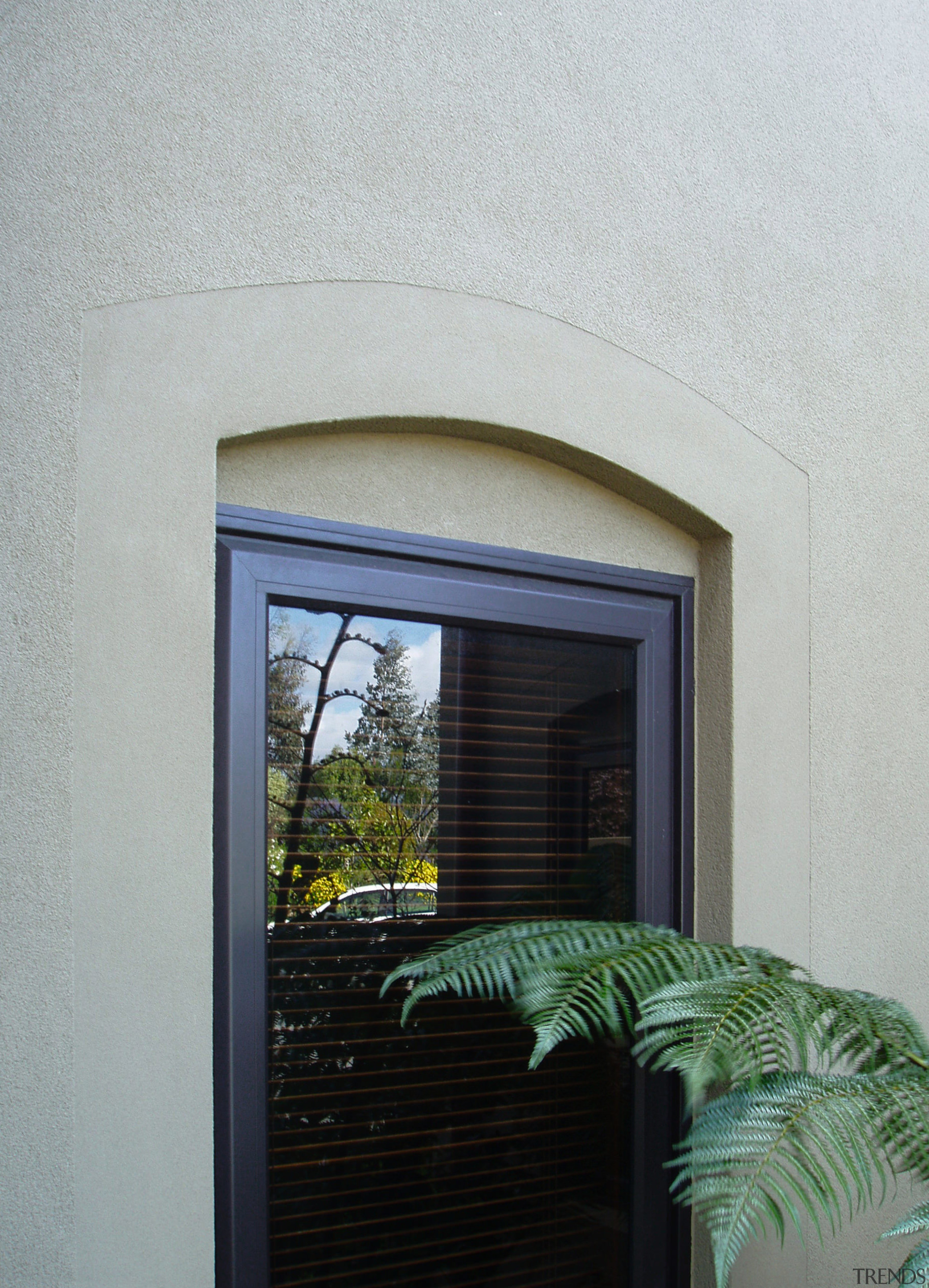 This home.designed by architect Colin Duckett of Duckett architecture, door, facade, home, house, wall, window, gray