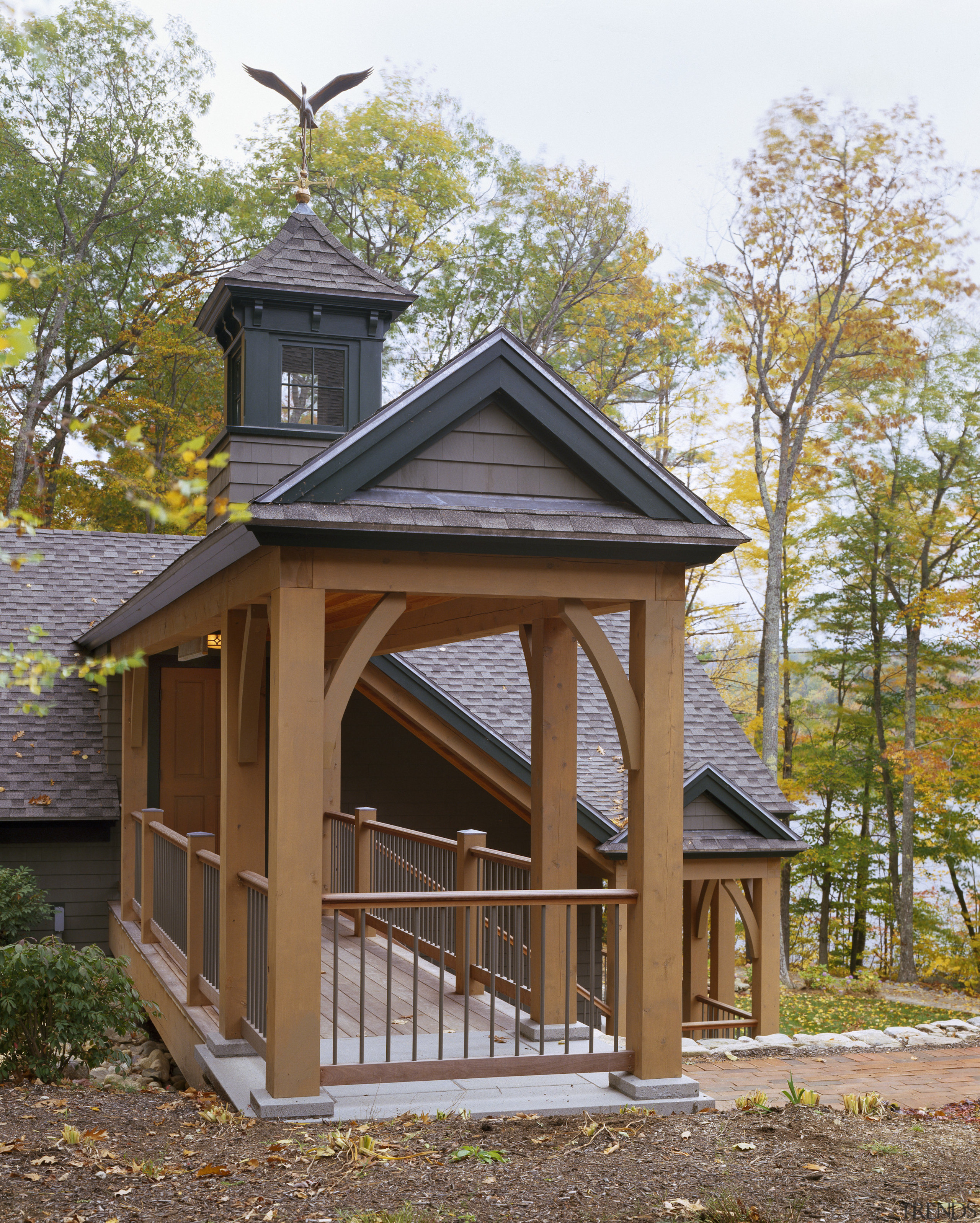 View of the holiday homes exterior featuring white cottage, home, house, log cabin, outdoor structure, real estate, shed, siding, brown