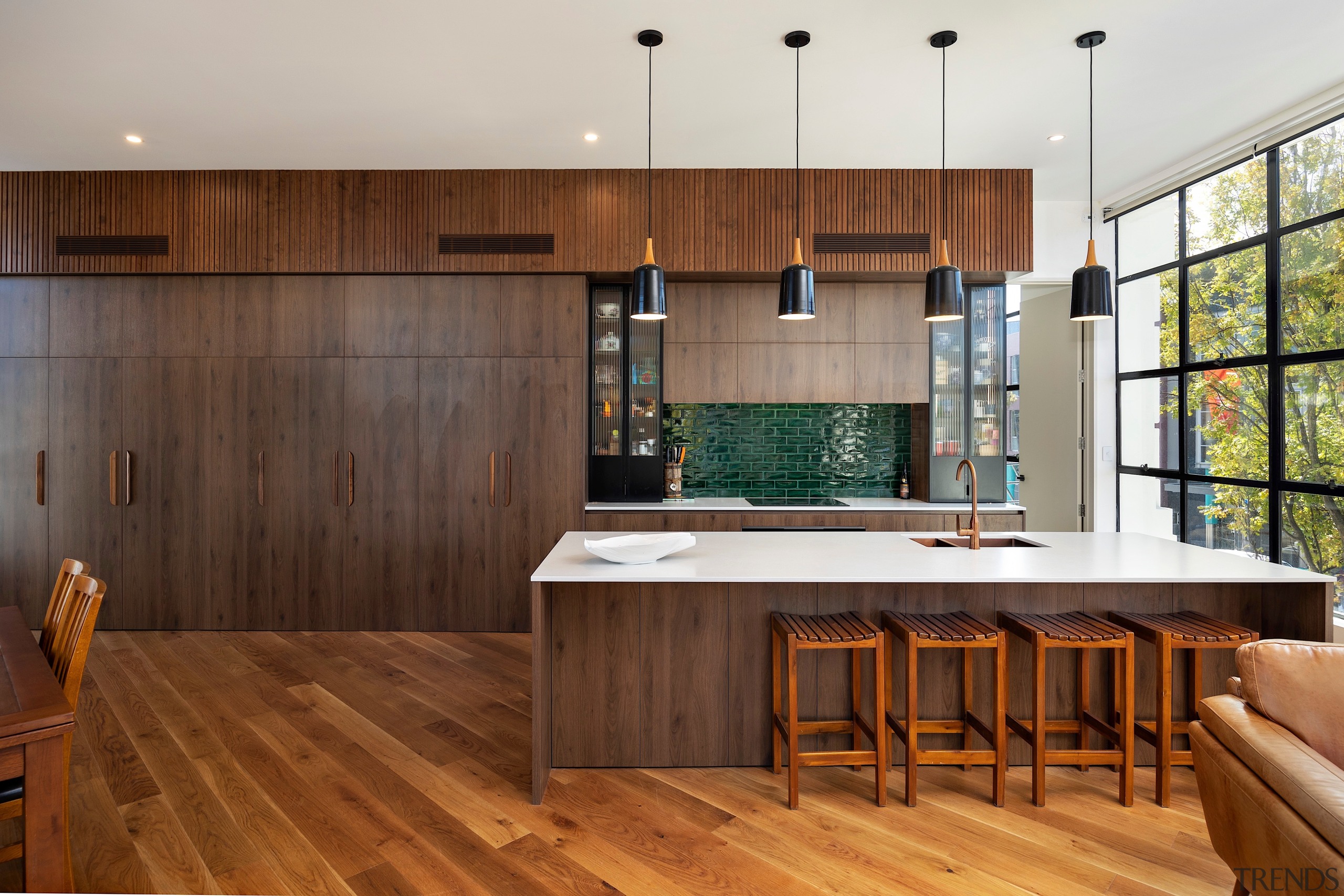 An enduring engineered timber floor brings visual warmth.&nbsp; 