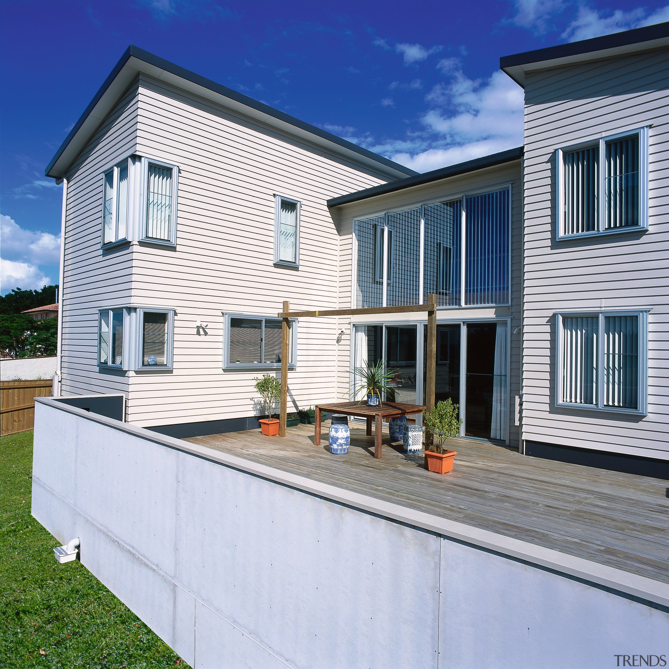 Exterior of two storey home with cream weatherboard cottage, elevation, facade, home, house, property, real estate, residential area, siding, window, gray