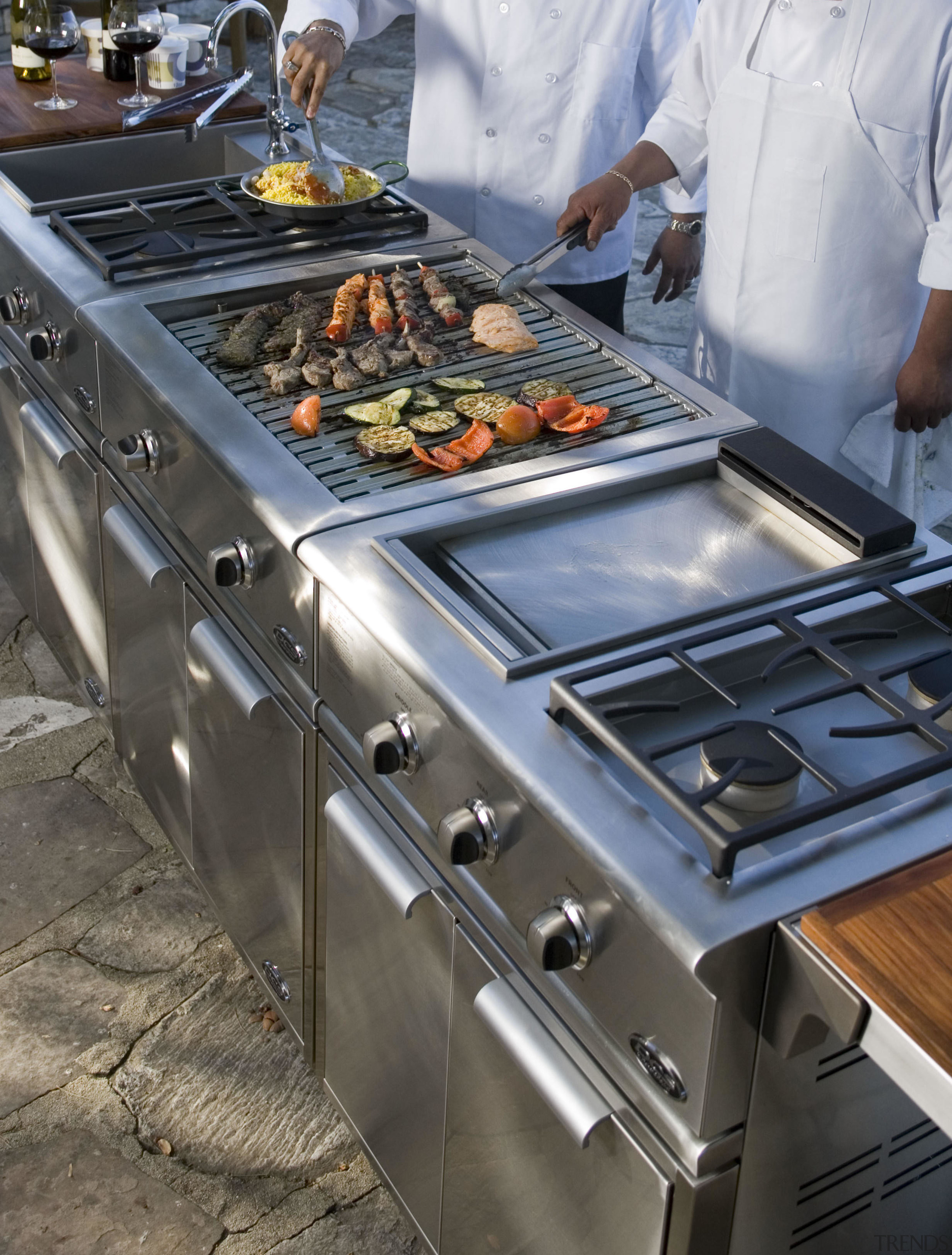 View of Fisher &amp; Paykel barbeque. - View cookware and bakeware, cuisine, food, kitchen appliance, outdoor grill, gray, black
