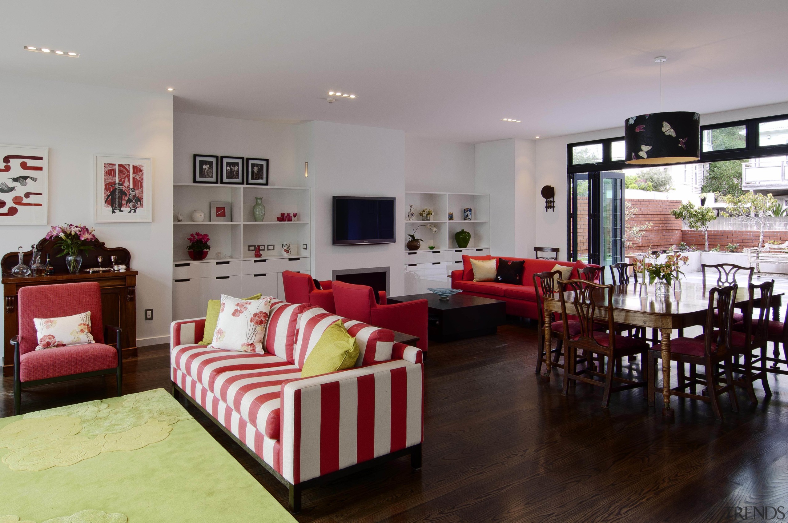 This house was designed by Gina Jones of home, house, interior design, living room, property, real estate, room, gray, black