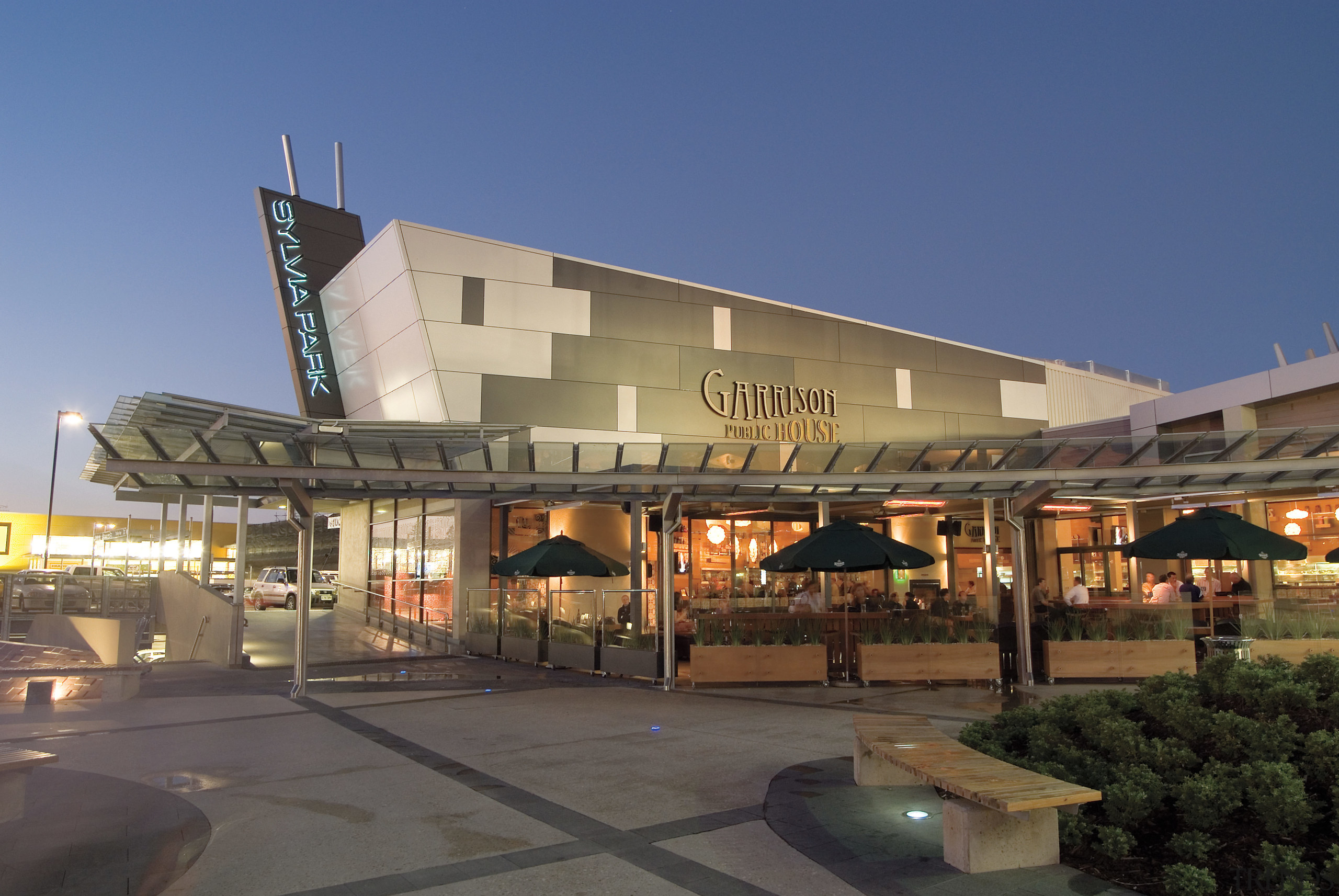 A view of the Garrison Public House at architecture, building, mixed use, real estate, blue