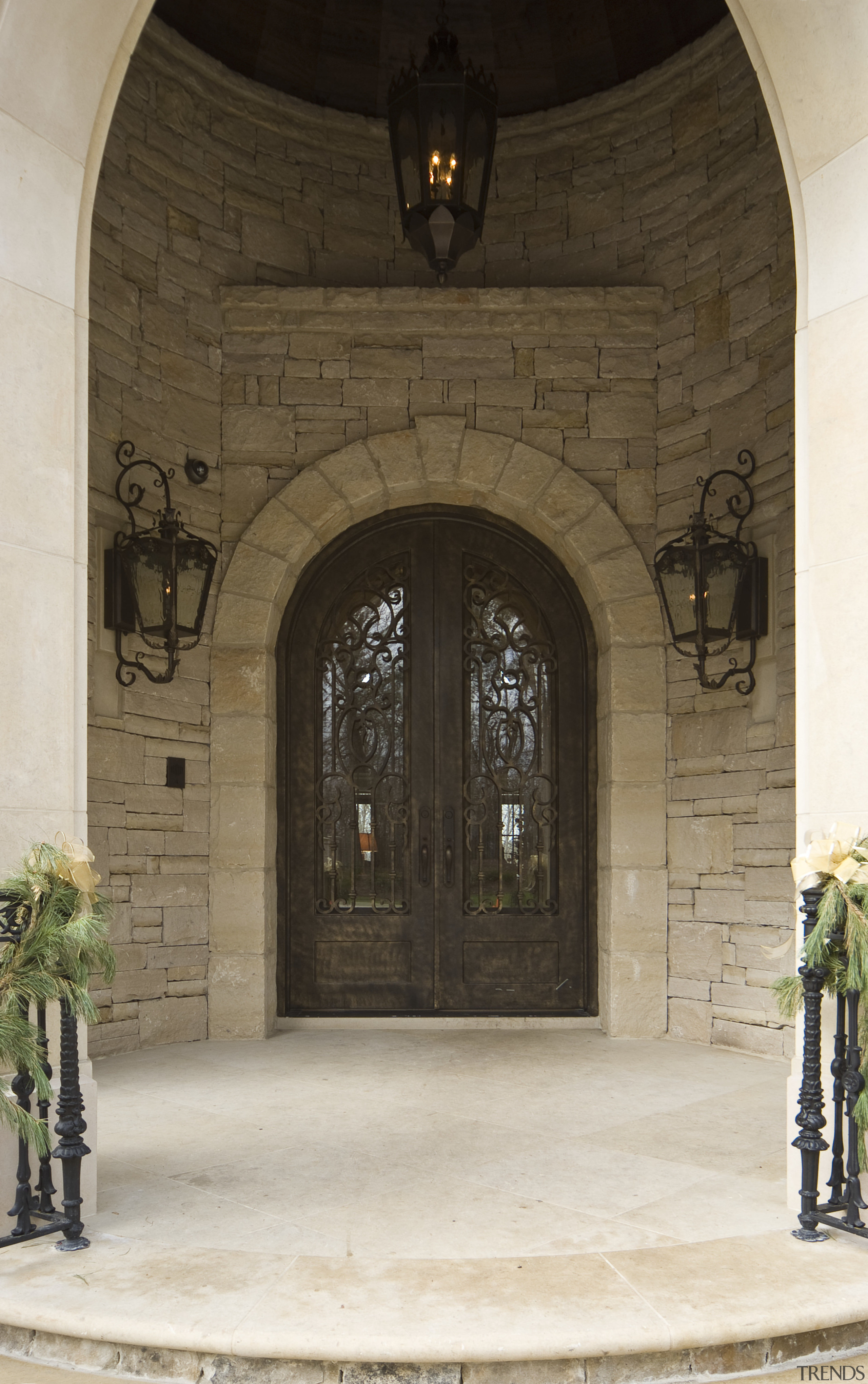 Castle Entries was contracted to provide a wrought arch, door, estate, iron, window, brown, white