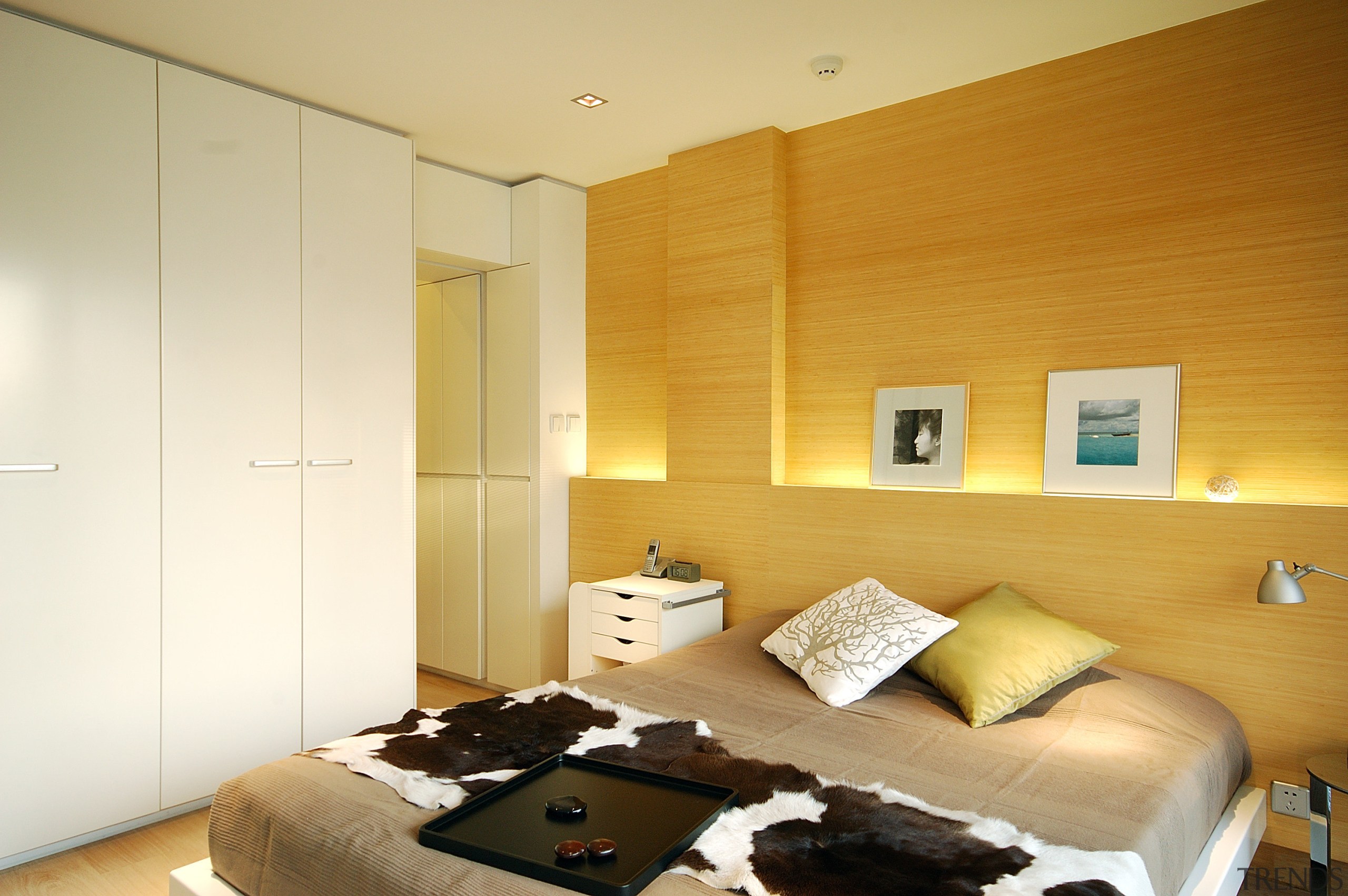 Image of the master bedroom which features a bed frame, bedroom, ceiling, floor, home, interior design, living room, real estate, room, suite, wall, wood, orange