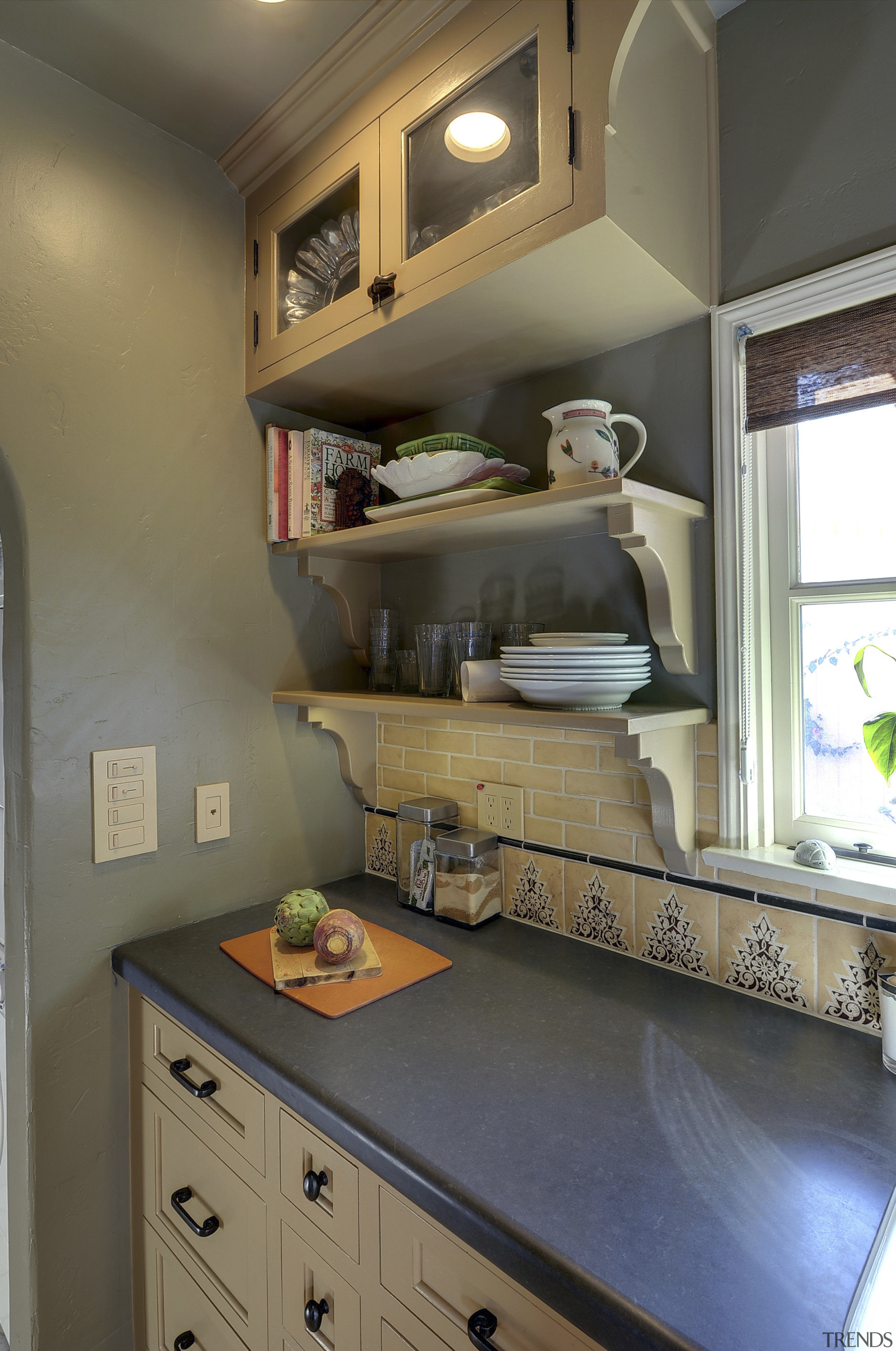 View of Spanish-style home with open shelving and cabinetry, countertop, furniture, home, house, interior design, kitchen, room, shelf, wall, brown, gray