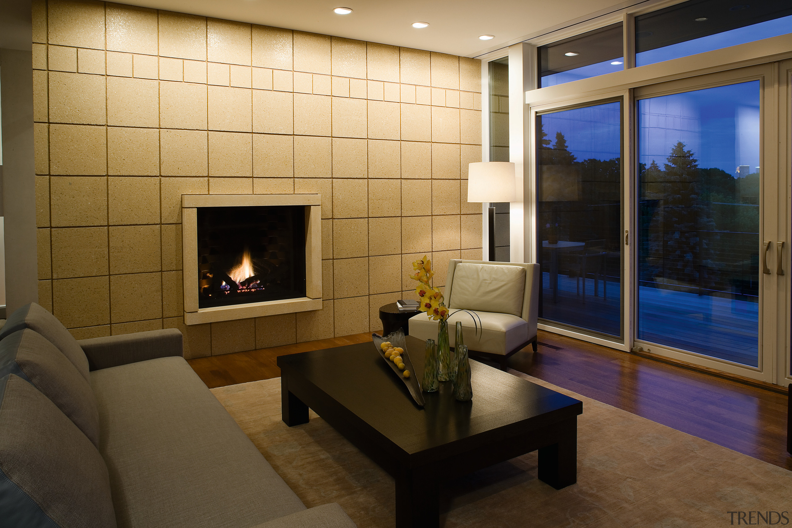 view of this lounge featuring home automation products ceiling, fireplace, floor, flooring, hearth, interior design, living room, lobby, real estate, room, wall, wood flooring, brown