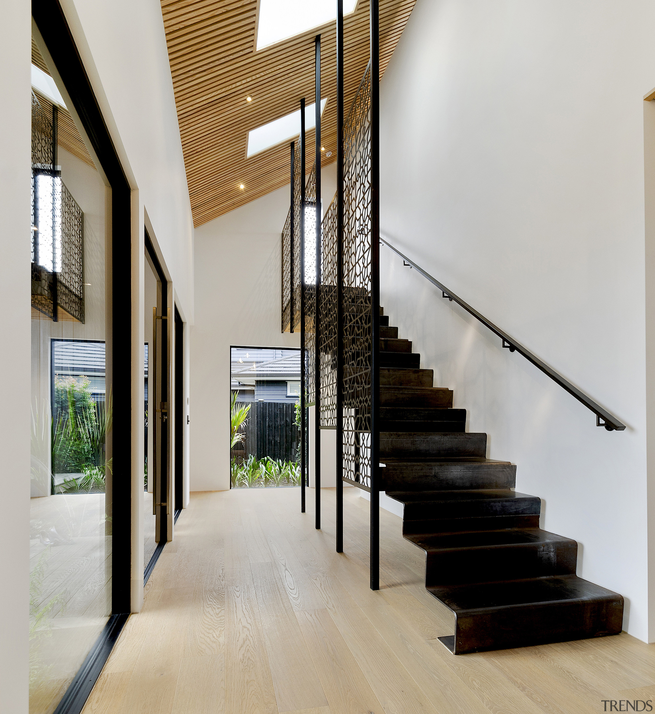 A fabulous steel staircase is one early-seen feature gray