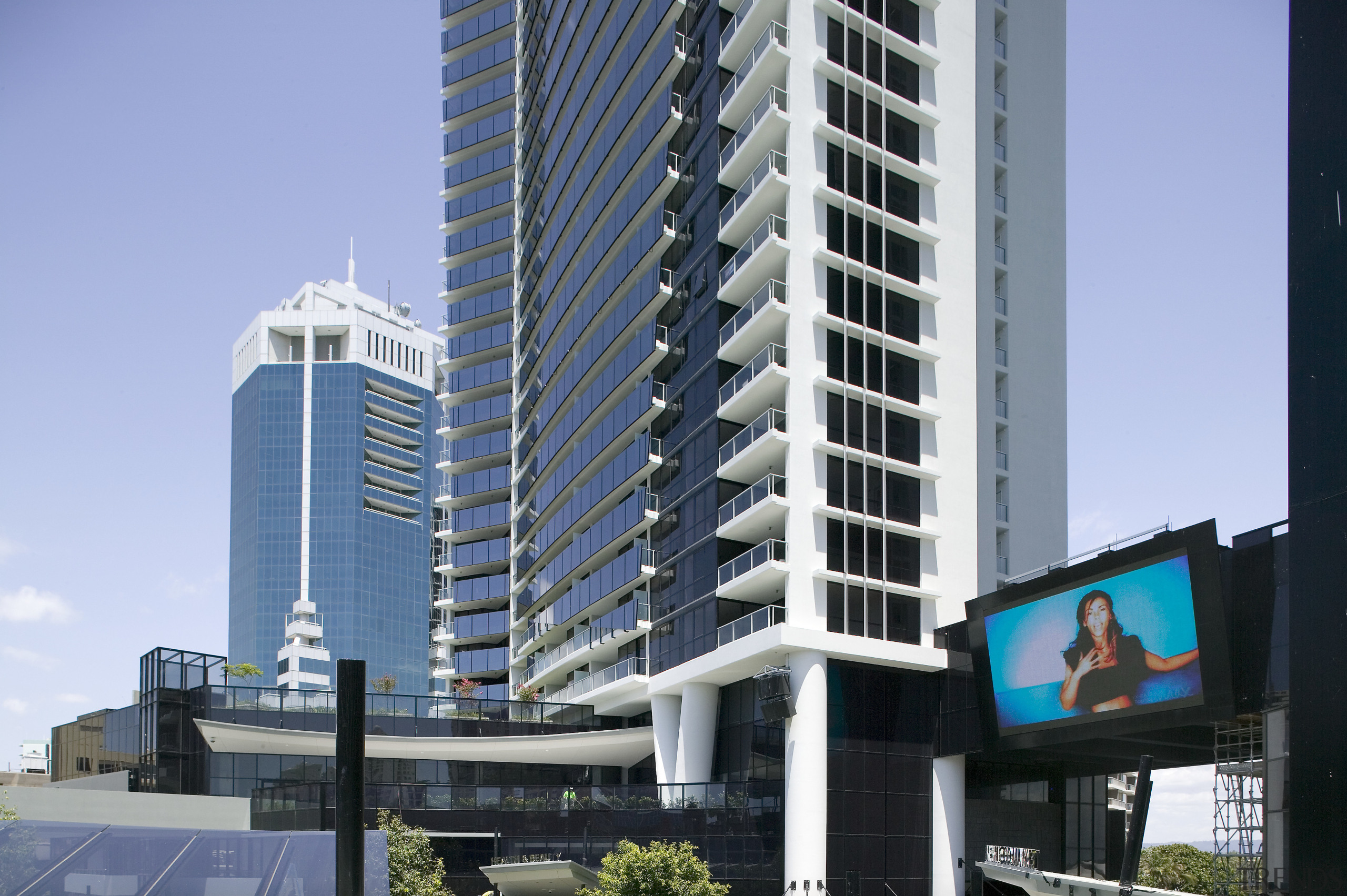 A view of the 50  metre squared apartment, architecture, building, city, commercial building, condominium, corporate headquarters, daytime, downtown, headquarters, hotel, metropolis, metropolitan area, mixed use, real estate, skyscraper, tower block, urban area, teal