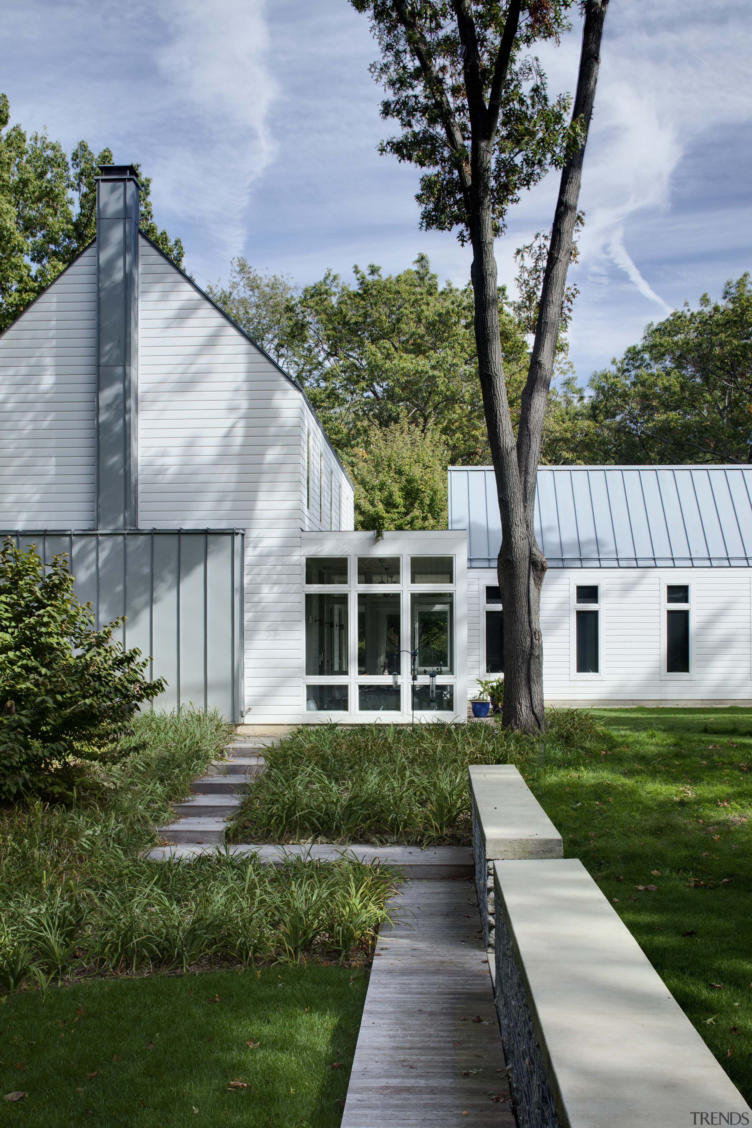 View of home with self-contained unit above garage, architecture, cottage, farmhouse, home, house, plant, real estate, residential area, tree