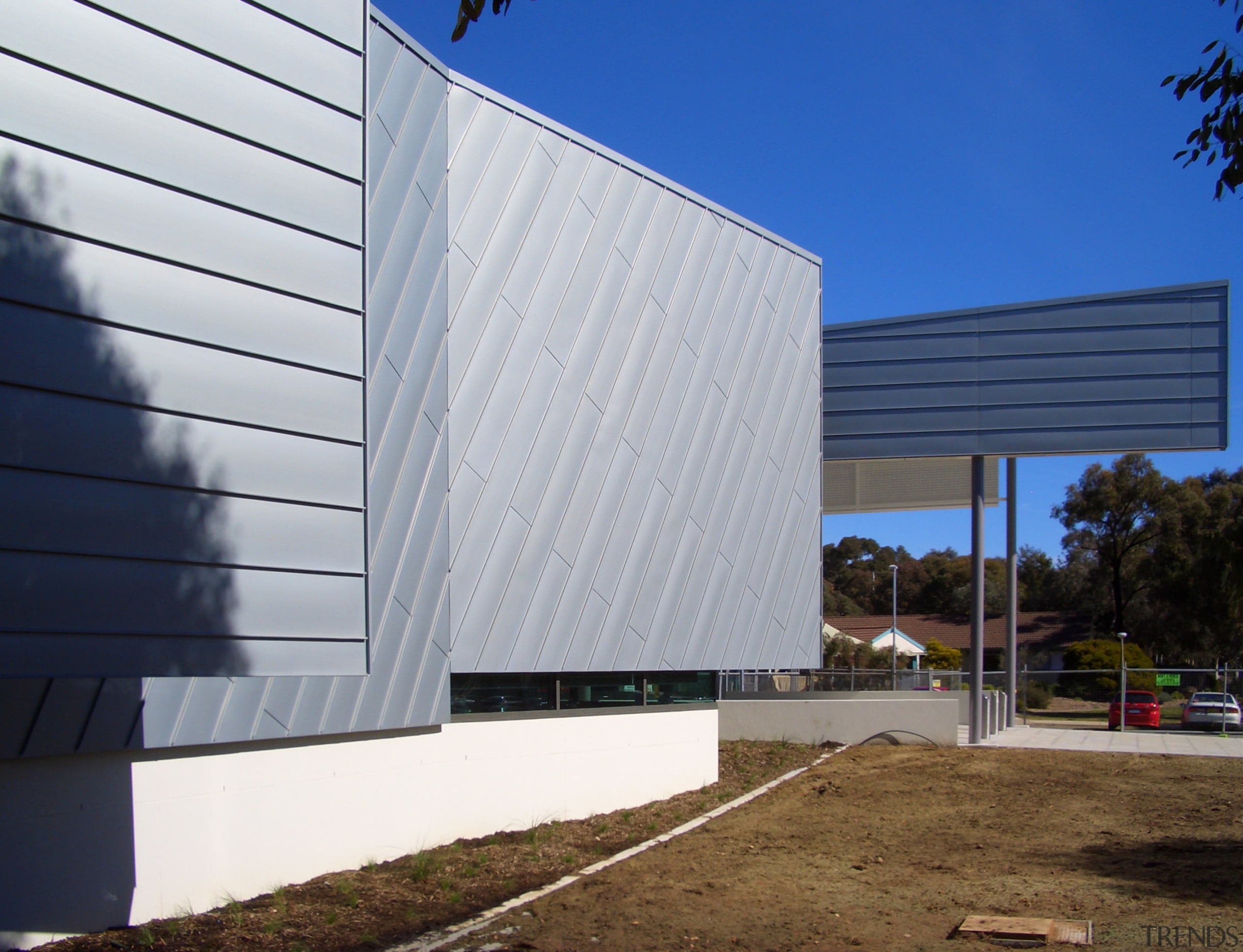 Exterior view of the National Centre for Social architecture, building, commercial building, corporate headquarters, daylighting, facade, headquarters, house, real estate, shed, siding, sky, structure, window, gray, blue