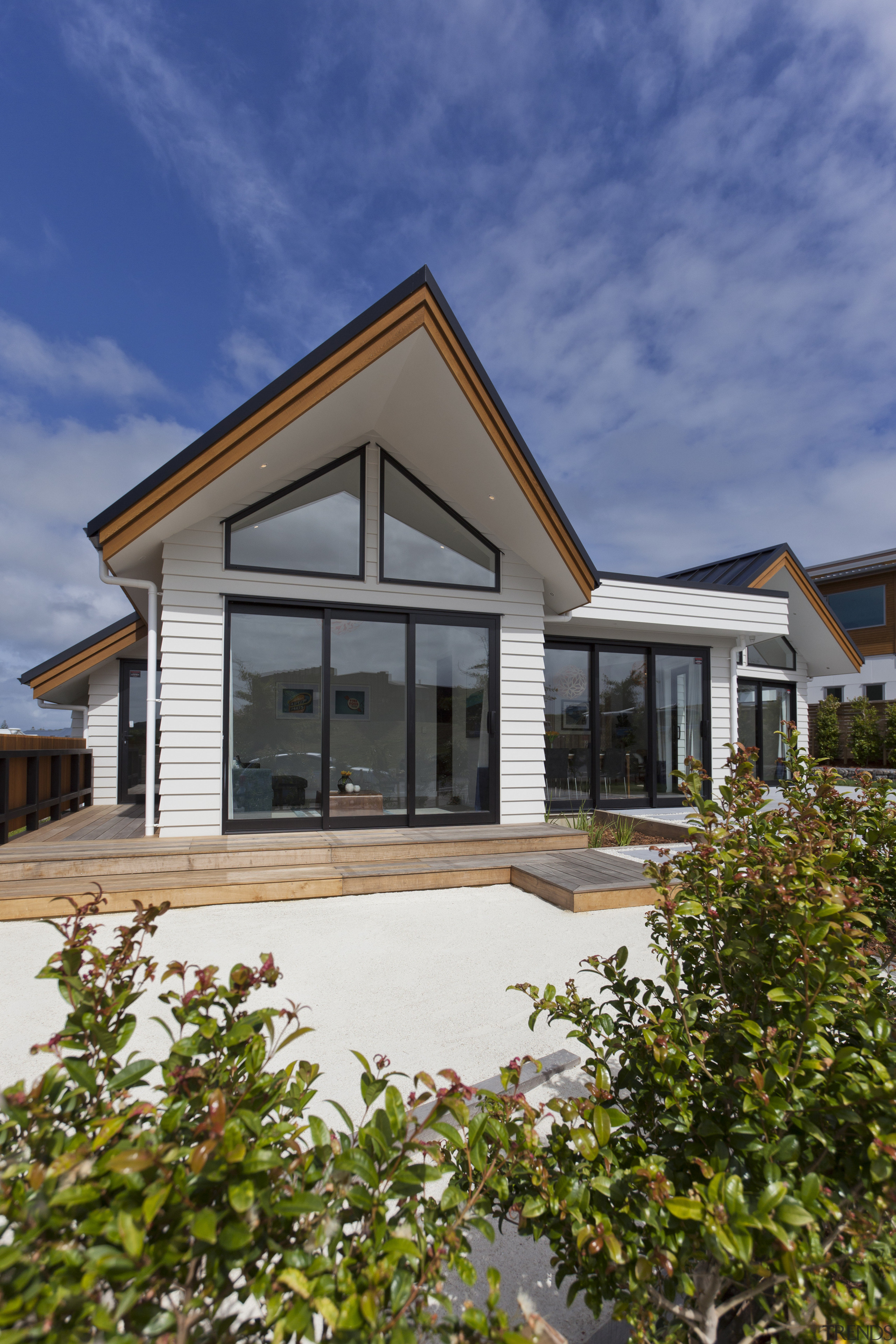 Living areas are oriented to the north for architecture, cottage, estate, facade, home, house, property, real estate, residential area, siding, sky, villa, window, blue