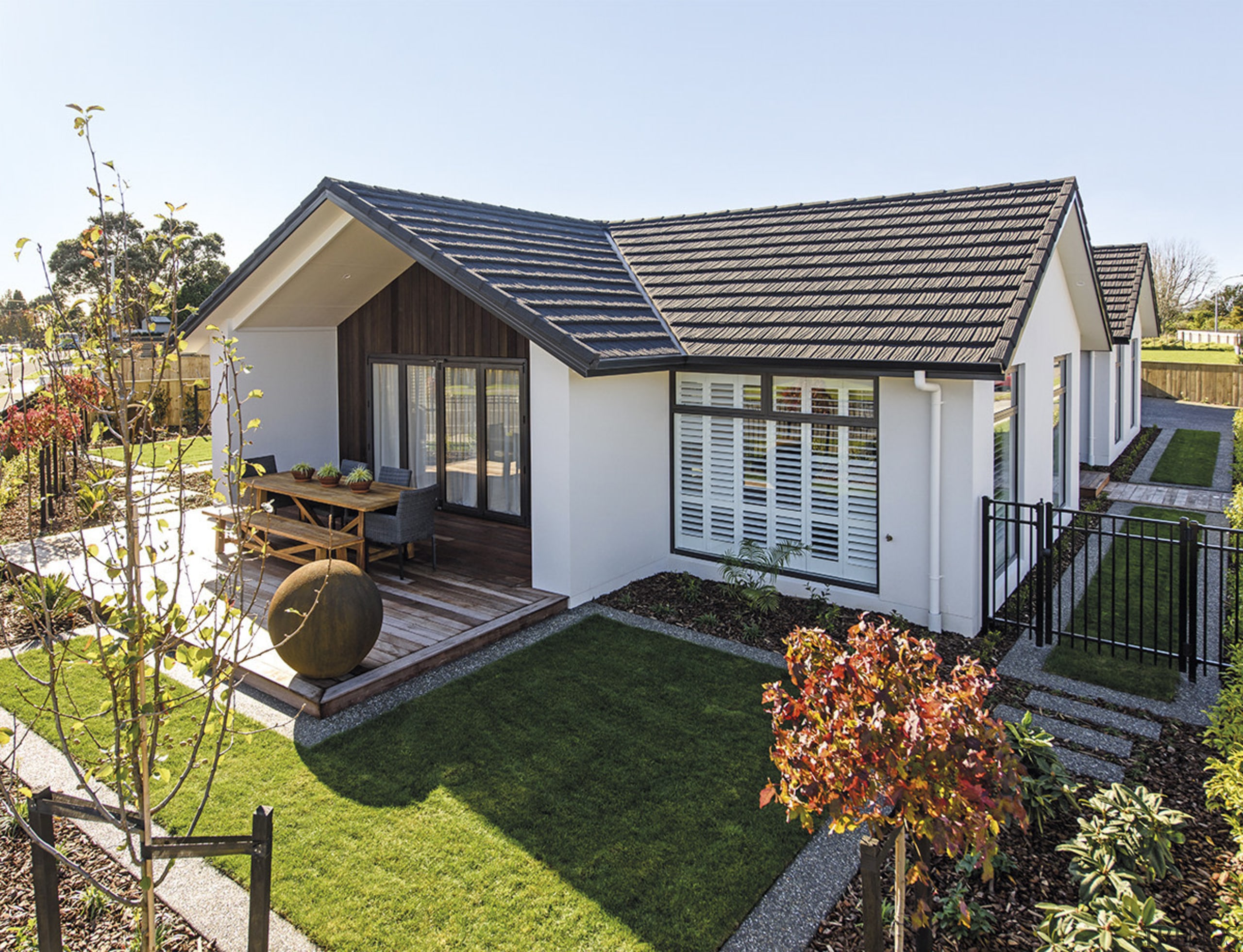 Classic weatherboards and roof tiles give this GJ backyard, cottage, estate, facade, farmhouse, home, house, property, real estate, residential area, siding, villa, white