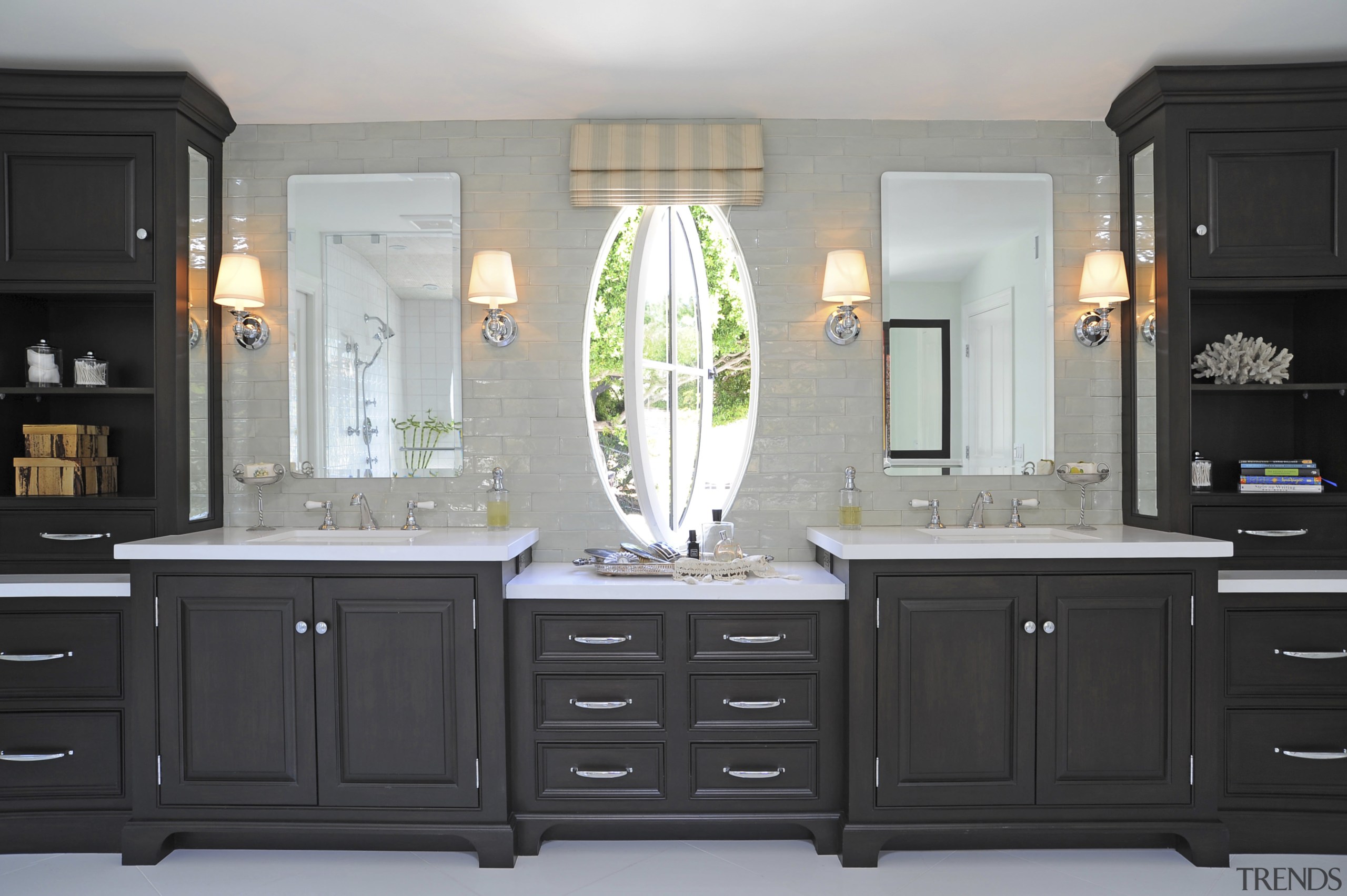 A pivoting oval feature window  provides an bathroom, bathroom accessory, bathroom cabinet, cabinetry, countertop, cuisine classique, furniture, interior design, kitchen, room, sink, gray, black