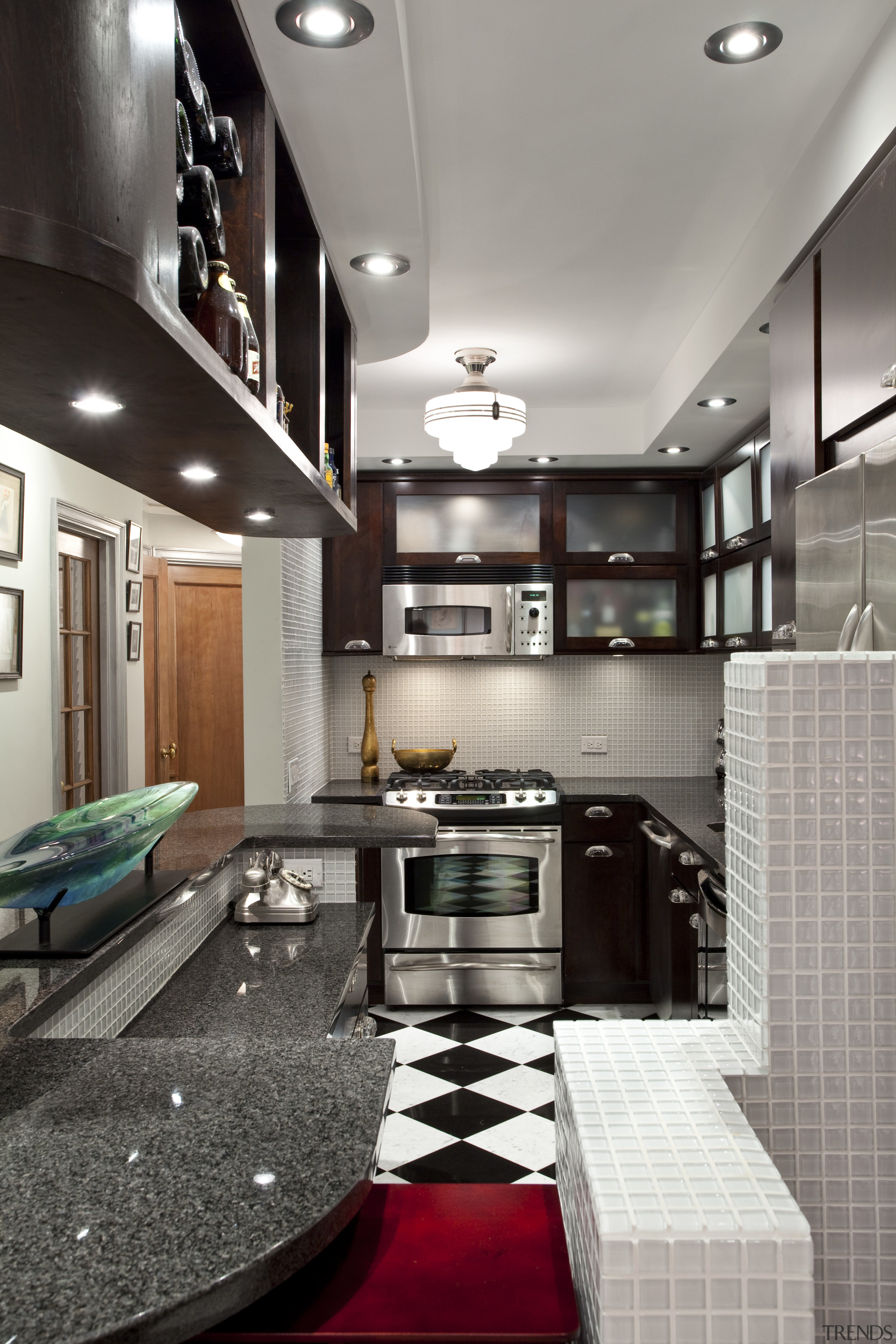 View of kitchen in Art-Deco styled apartment building, ceiling, countertop, interior design, kitchen, room, gray, black