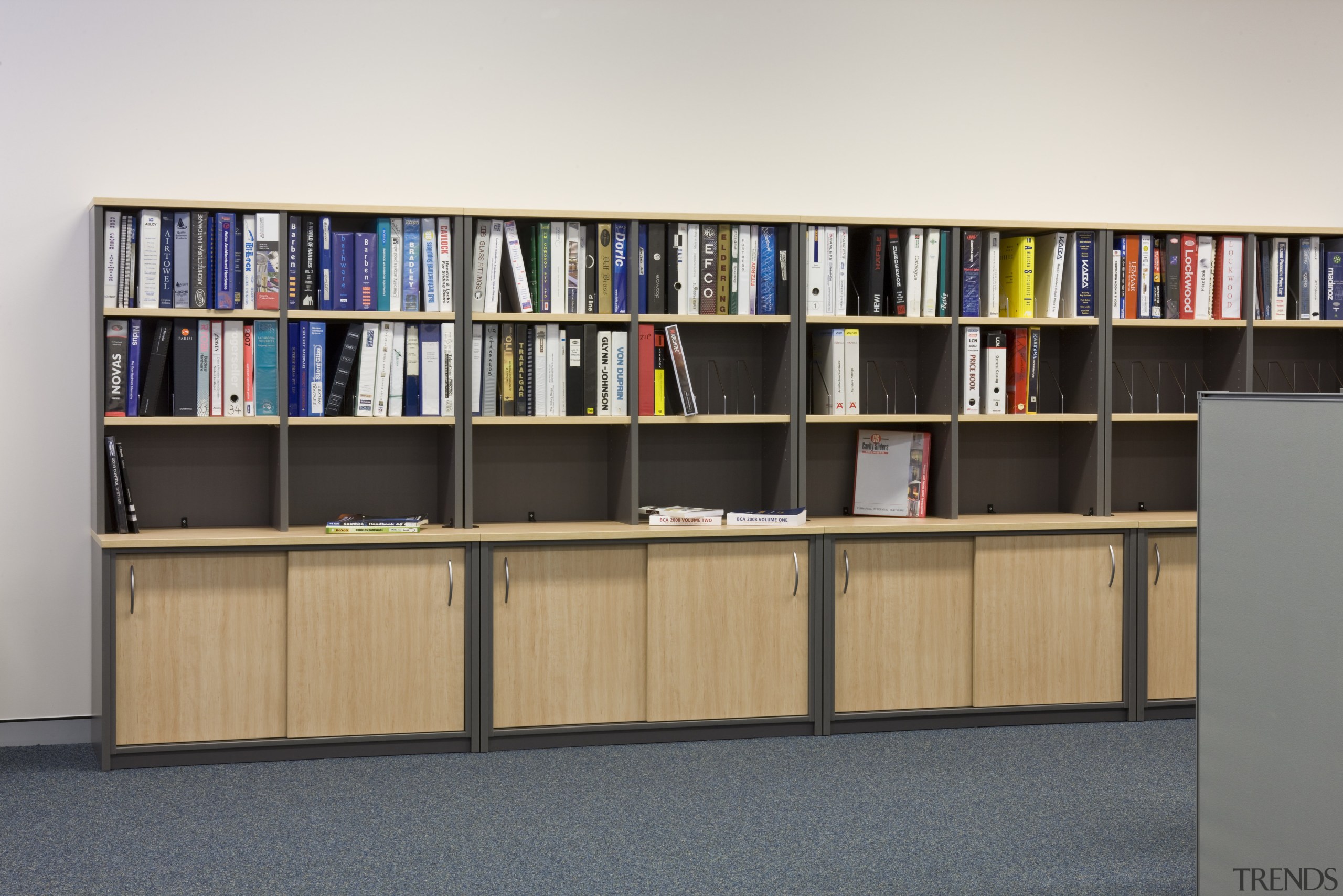 Image of desk and shelving supplied by The bookcase, furniture, institution, library, library science, product design, public library, shelf, shelving, white, gray