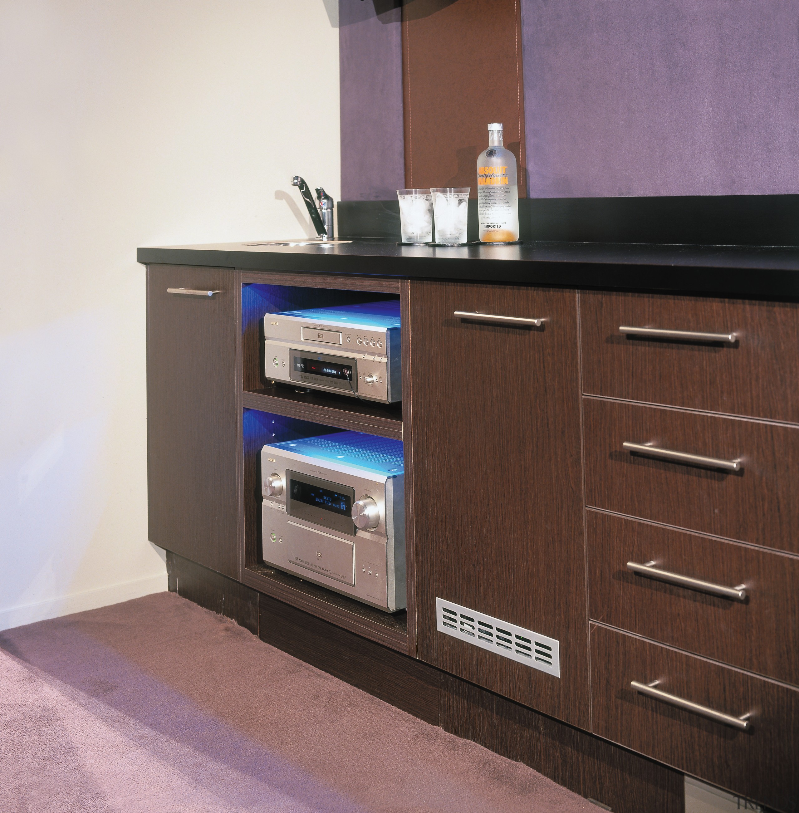 view of the cabinet holding the denon amplifier cabinetry, chest of drawers, countertop, drawer, furniture, home appliance, kitchen, kitchen appliance, kitchen stove, product, brown, white