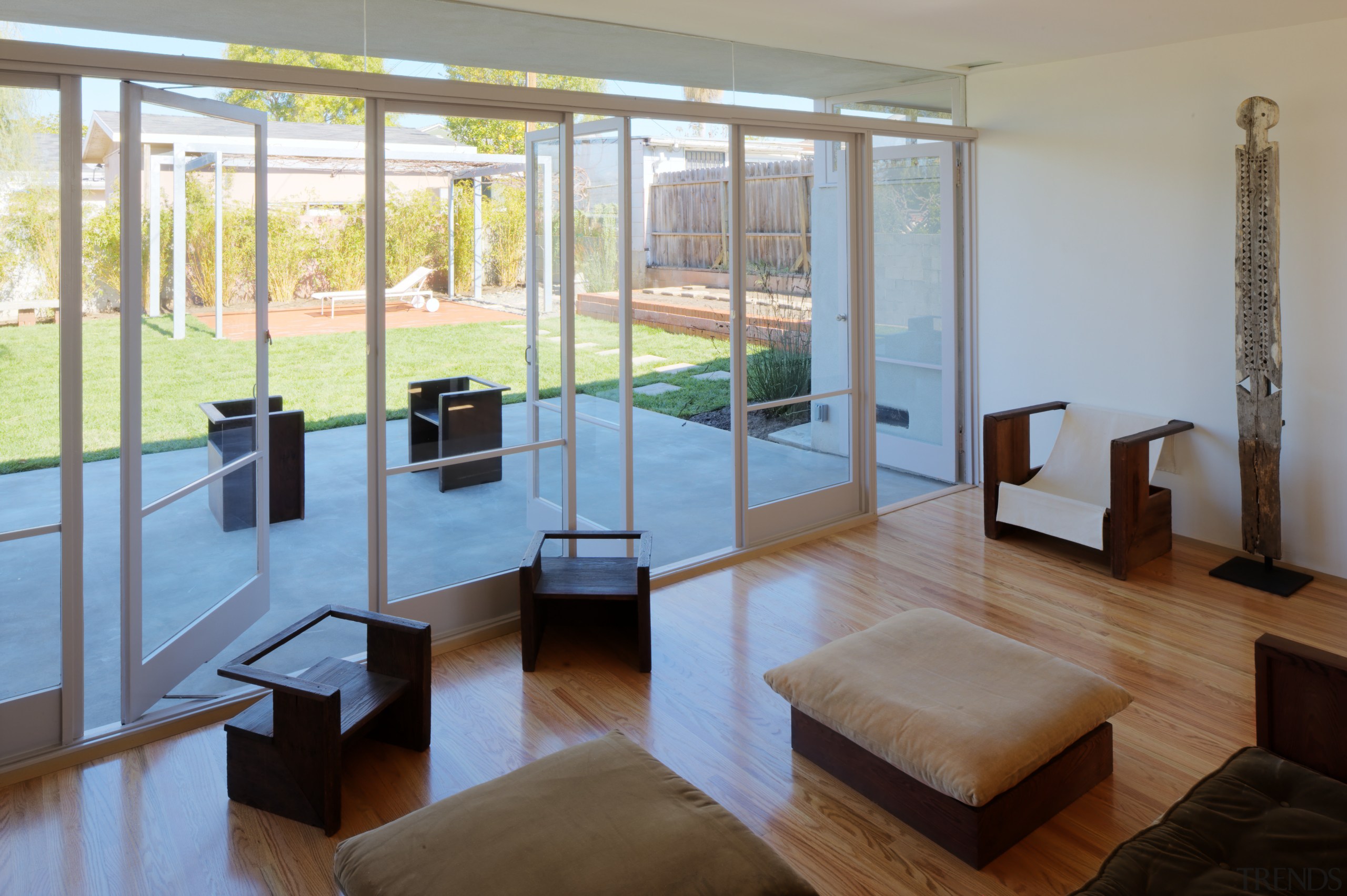 View of this contemporary home that was remodeled floor, flooring, interior design, real estate, window, wood, gray