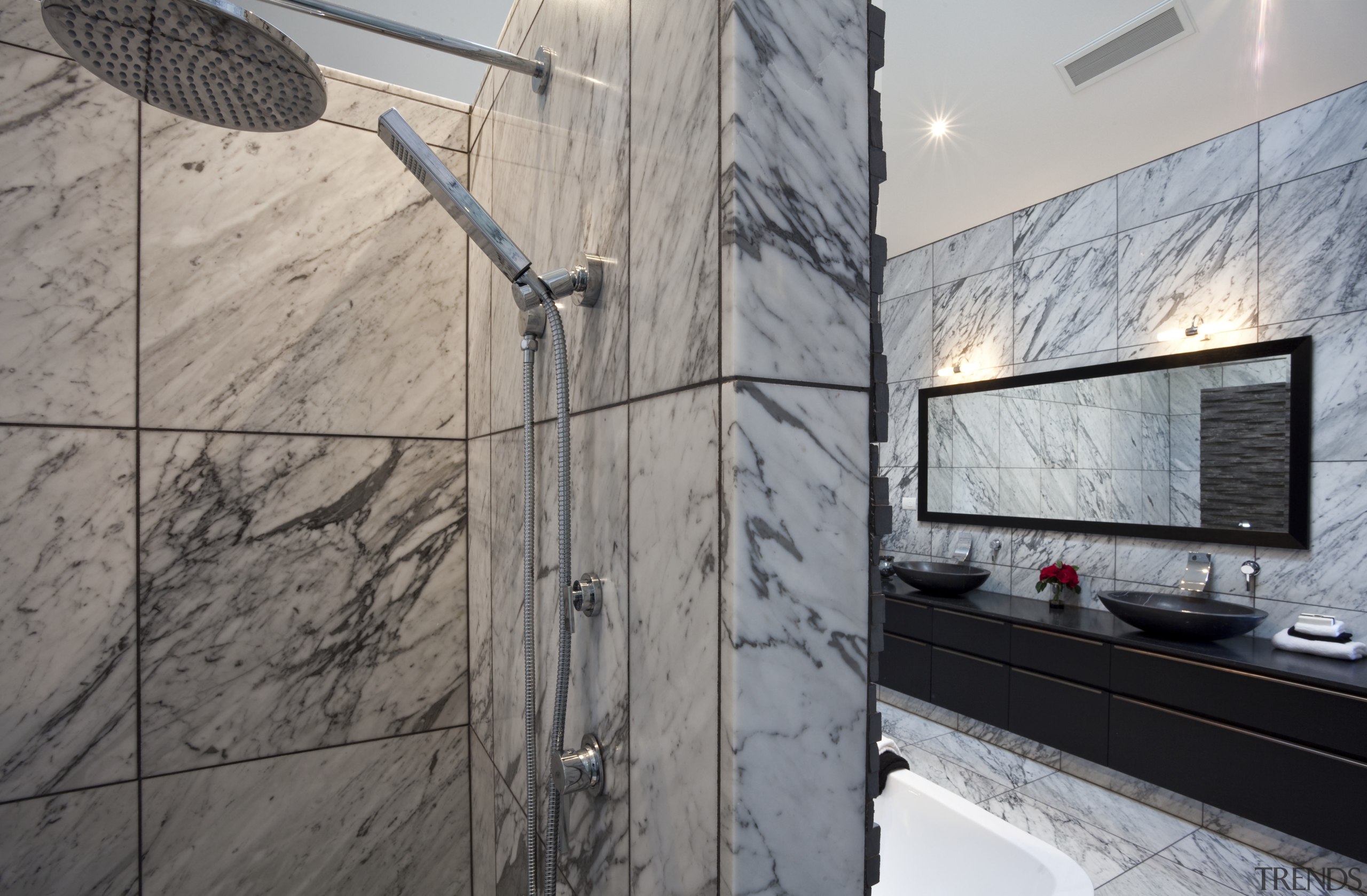 View of bedroom and bathroom with grey, black property, wall, gray