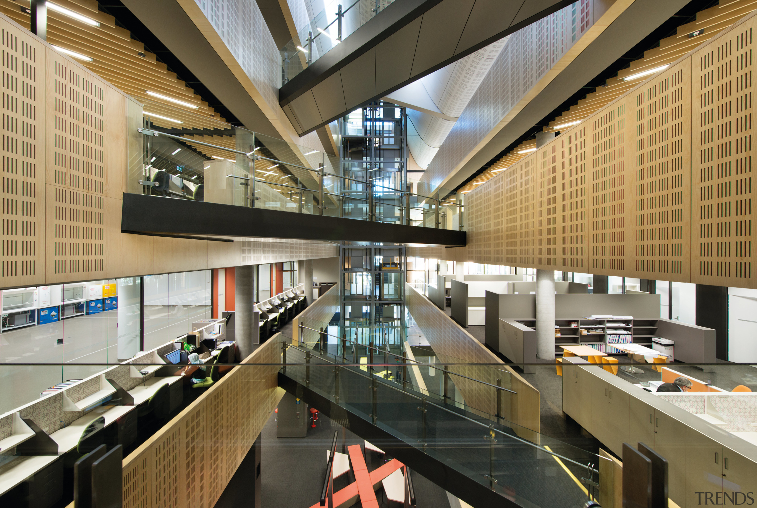 Natural light floods the large central atrium at architecture, building, daylighting, institution, interior design, lobby, black