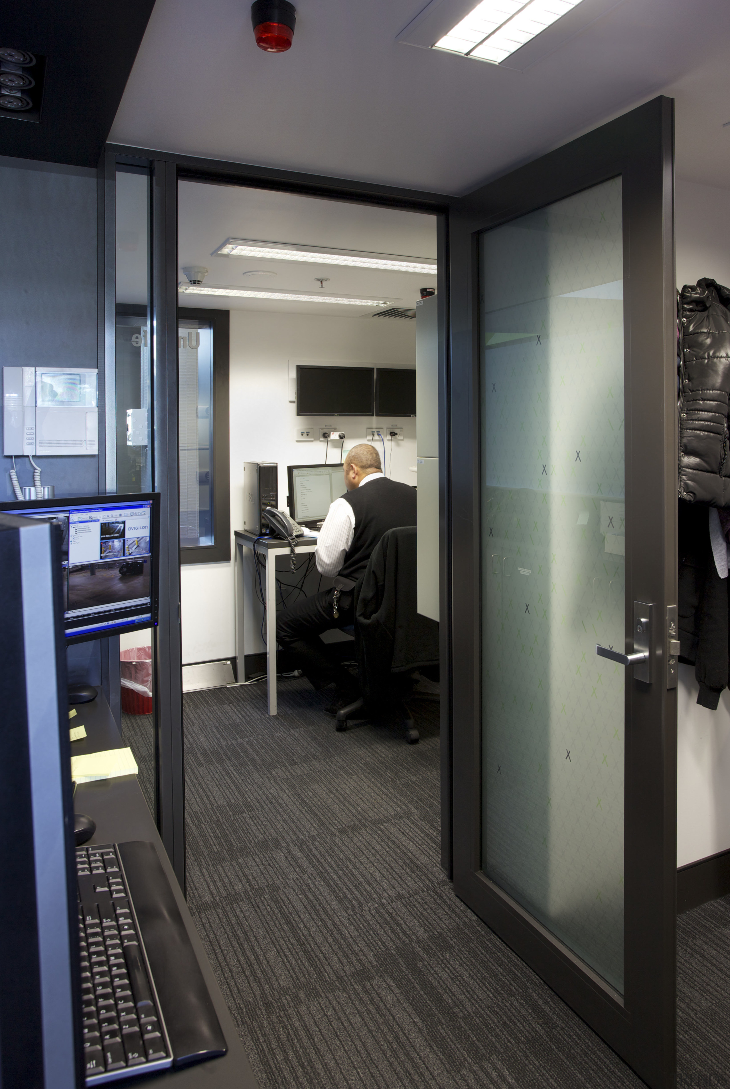 Ingersoll Rand Security Technologies specialises in door hardware. door, office, black, gray