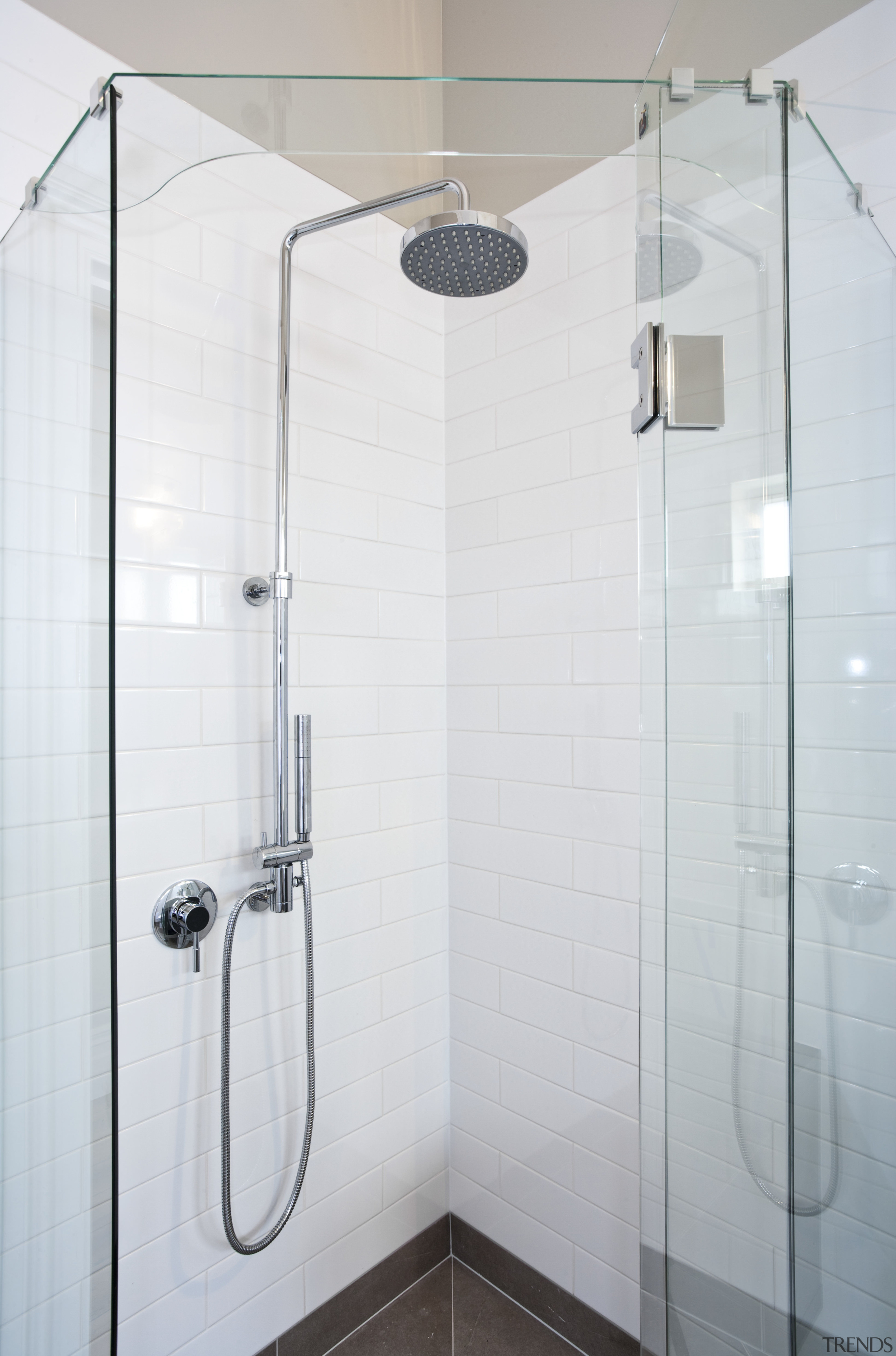 White subway tiles and Atlantis EasyTile frameless glass angle, bathroom, plumbing fixture, shower, tap, white