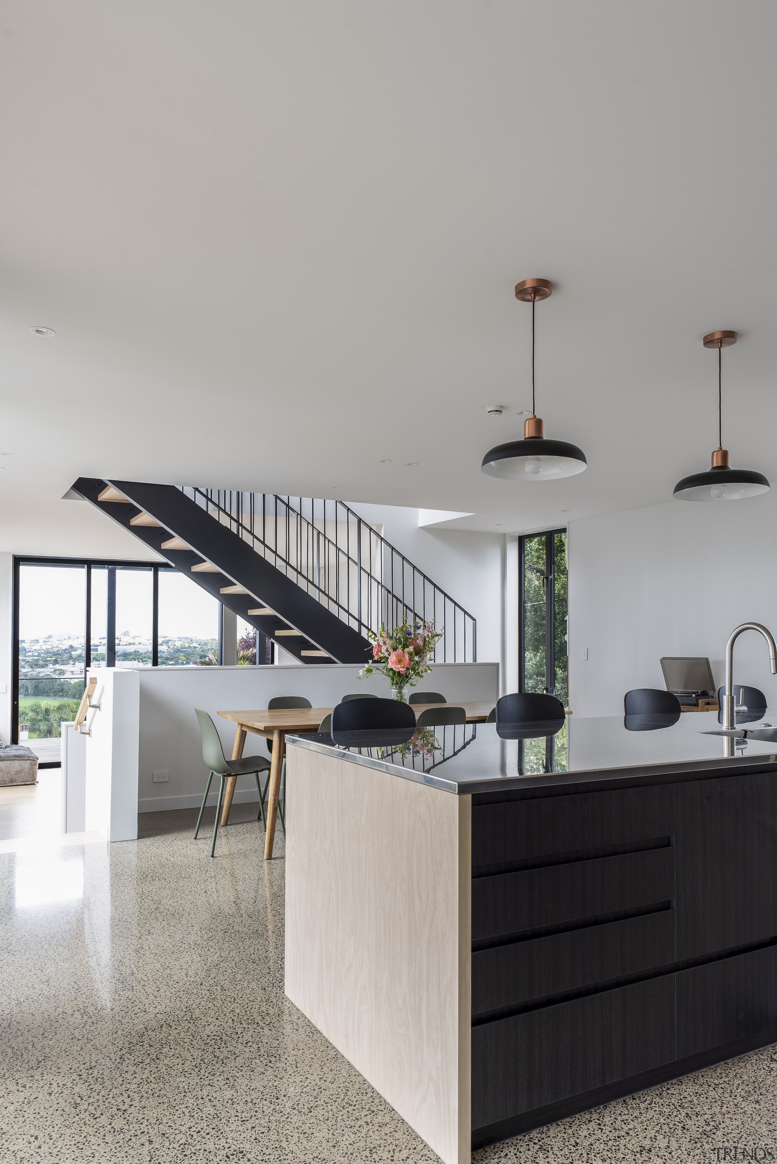 Looking to the dining area and stairs beyond 