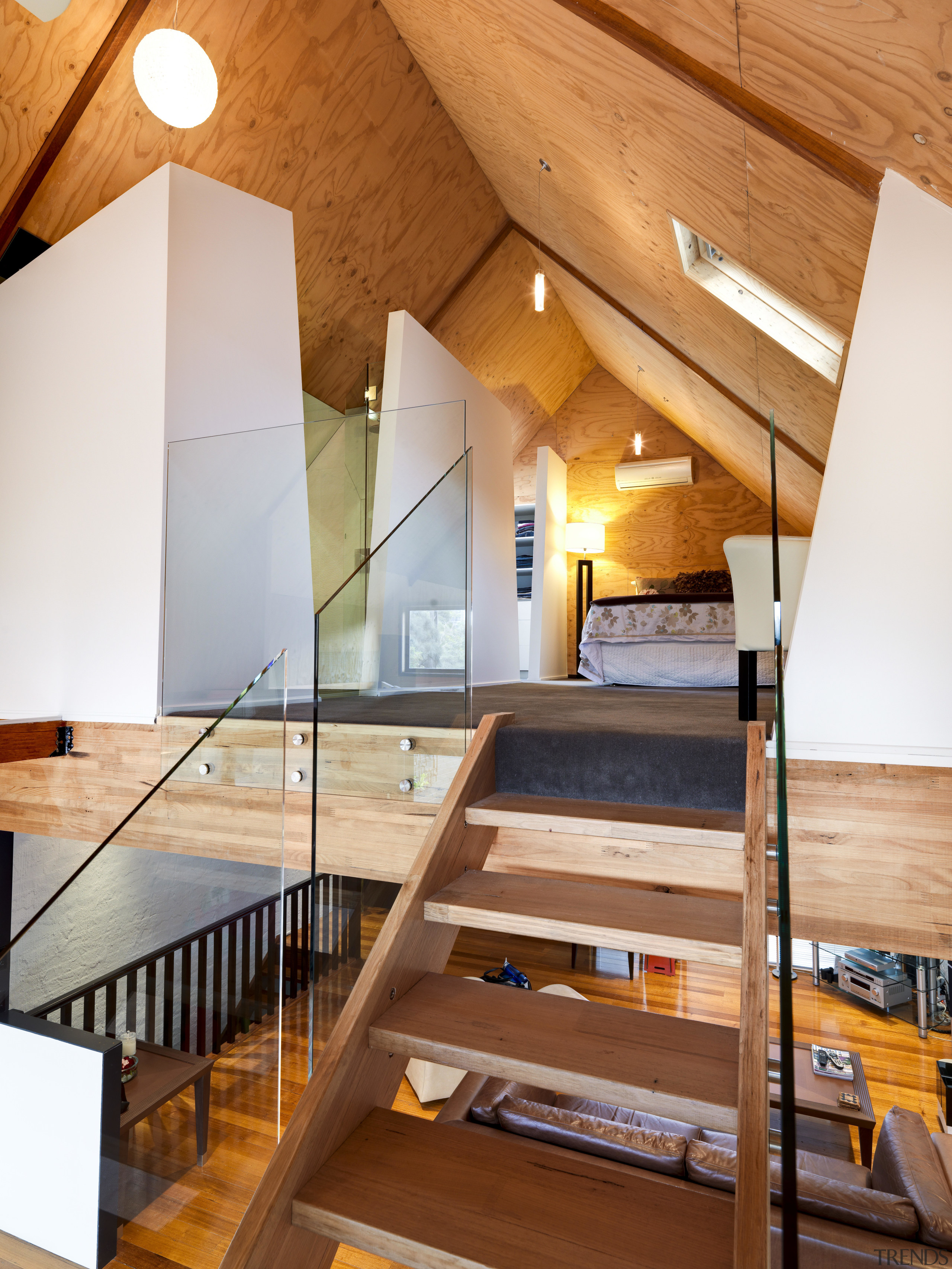 View of bathroom suite with angled openings - architecture, beam, ceiling, daylighting, floor, flooring, handrail, hardwood, home, house, interior design, loft, real estate, stairs, wood, white, brown, orange