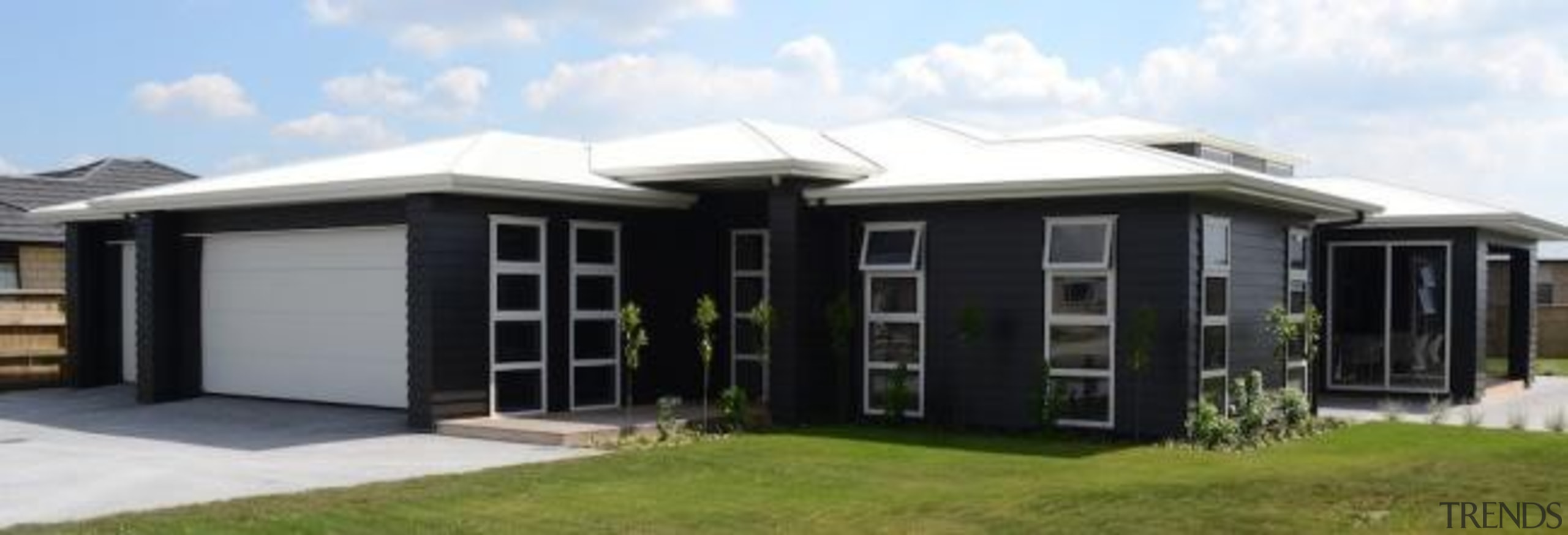 Featuring "Aniston" Fowler Homes Waikato Cambridge showhomeFowler Homes facade, home, house, property, real estate, roof, window, white, black