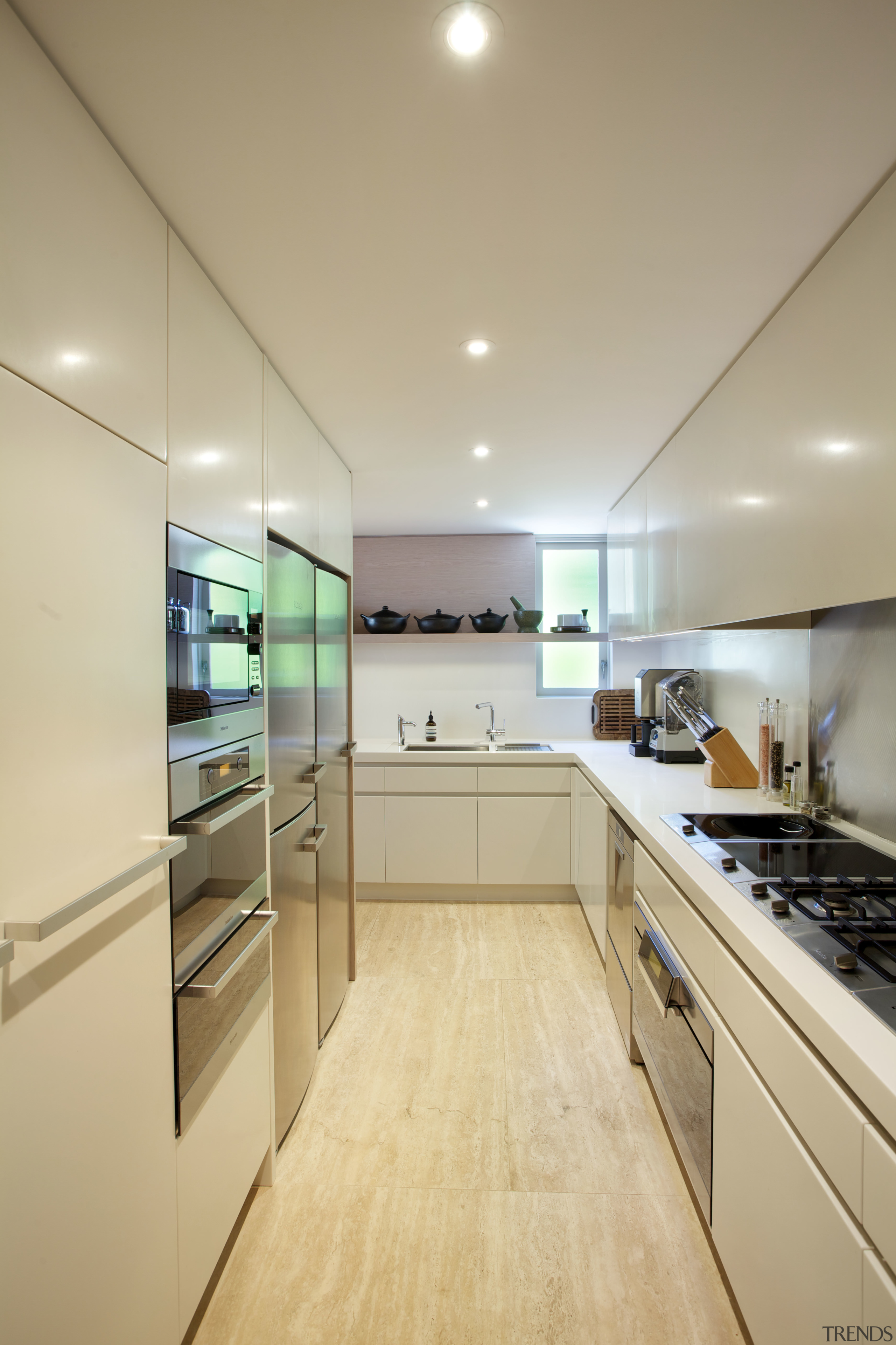 A second kitchen in this renovated house runs cabinetry, ceiling, countertop, cuisine classique, interior design, kitchen, real estate, room, orange