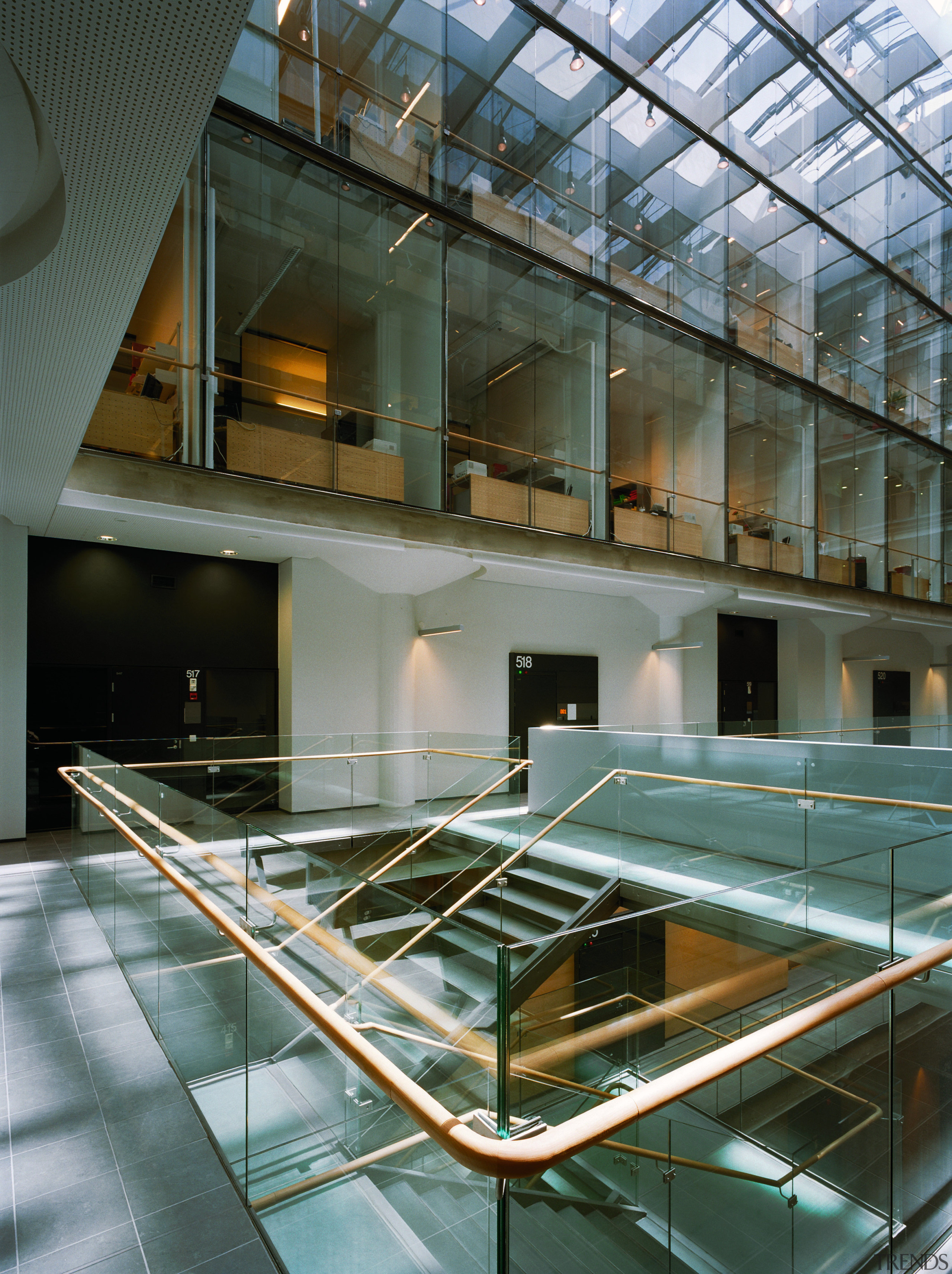 A viewof the stairways in the building. - architecture, building, condominium, daylighting, glass, interior design, gray