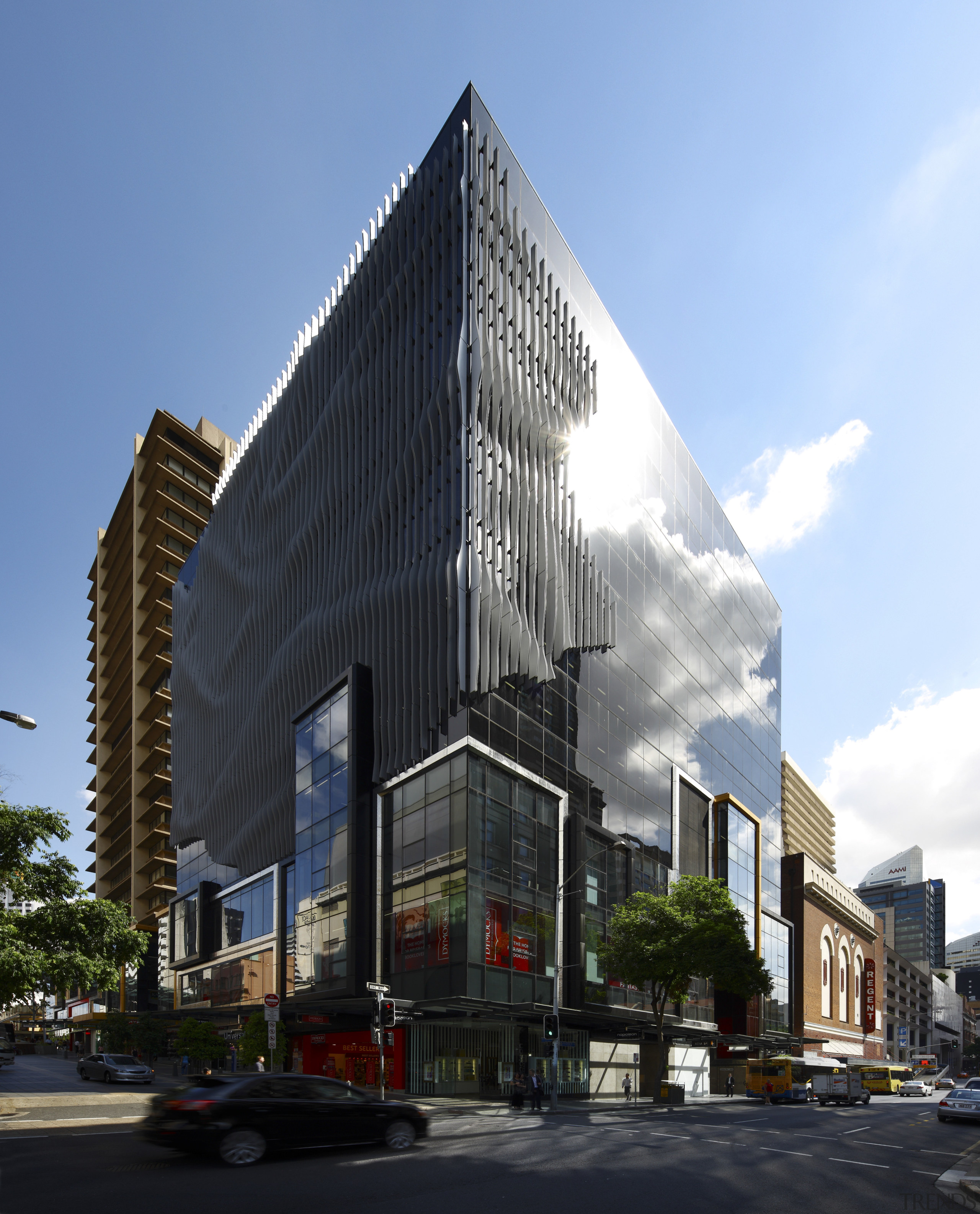 View of office tower with retail podium with architecture, building, city, commercial building, condominium, corporate headquarters, daytime, downtown, facade, headquarters, metropolis, metropolitan area, mixed use, neighbourhood, sky, skyscraper, tower block, teal, black