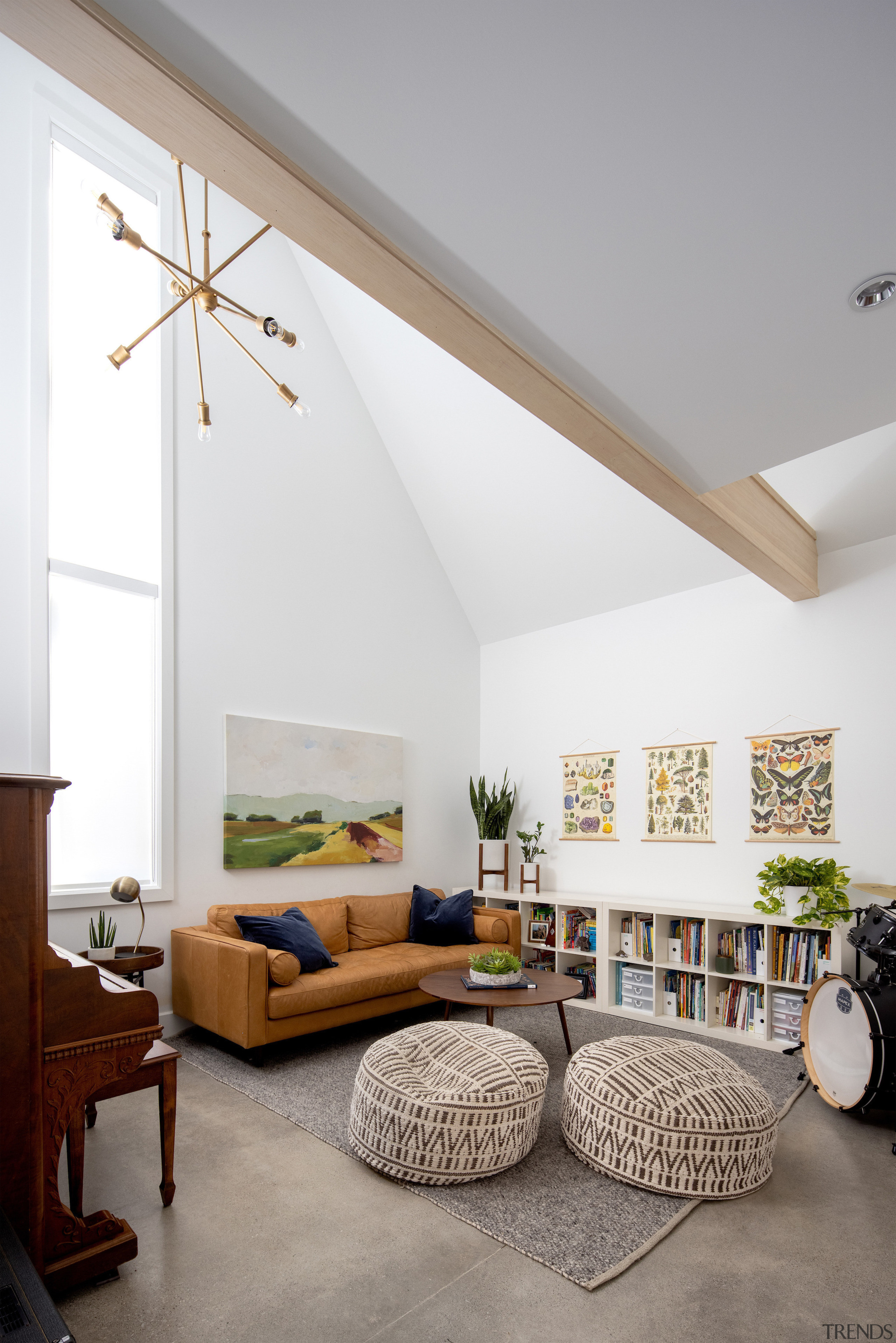 Gabled rooflines translate into high ceilings within the 