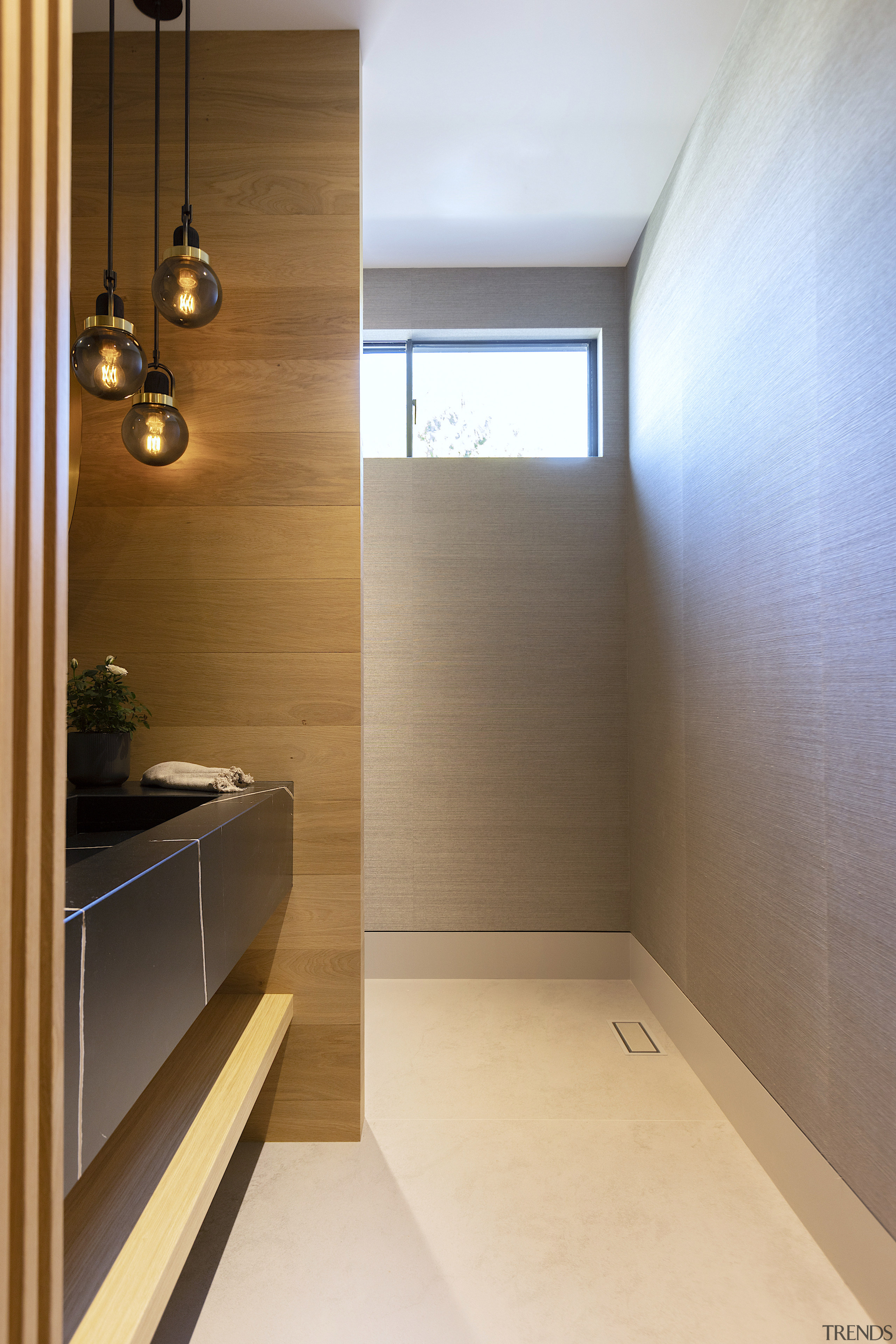 A privacy wall between the toilet and the 