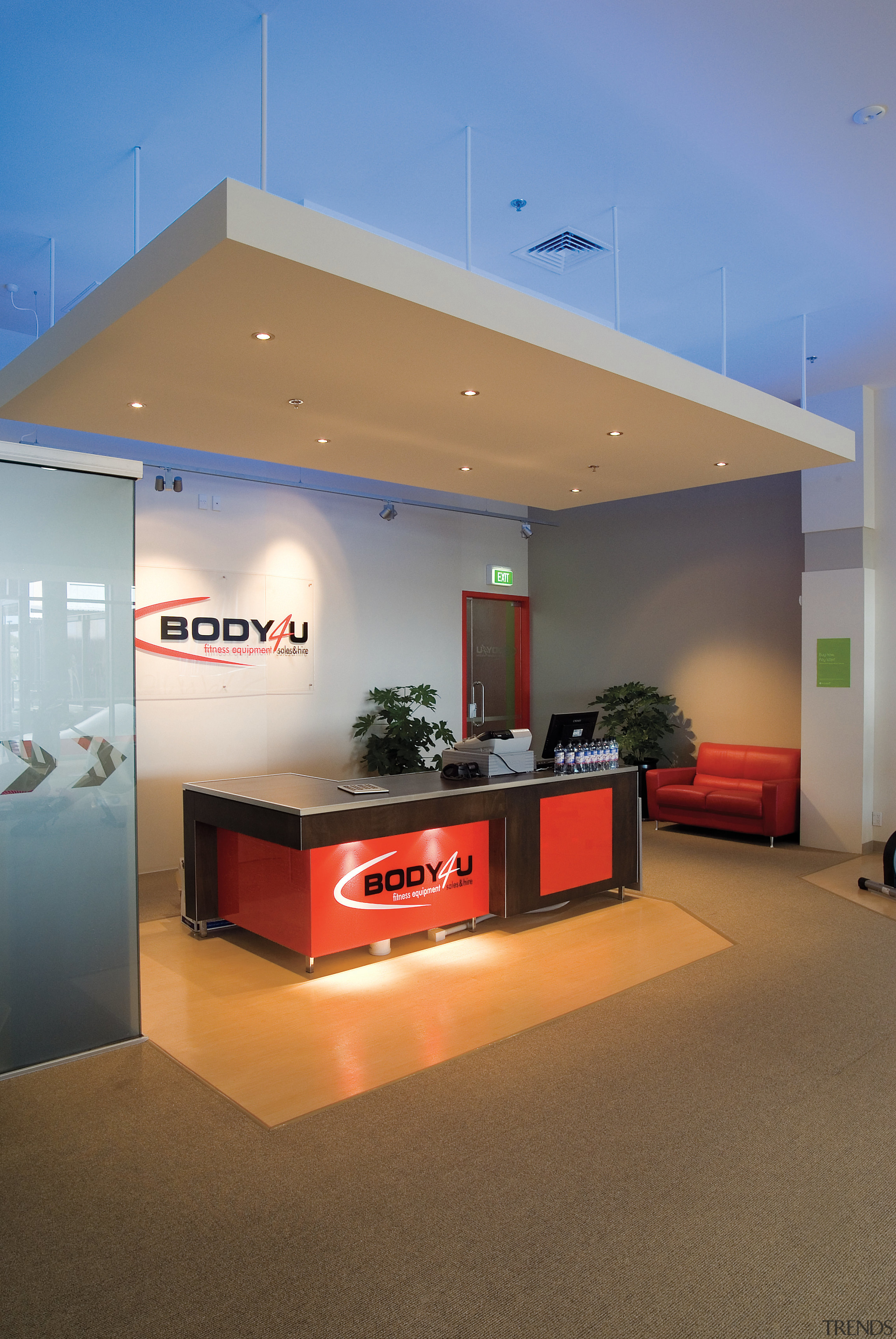 A view of a fitness store in Sylvia architecture, ceiling, interior design, real estate, brown