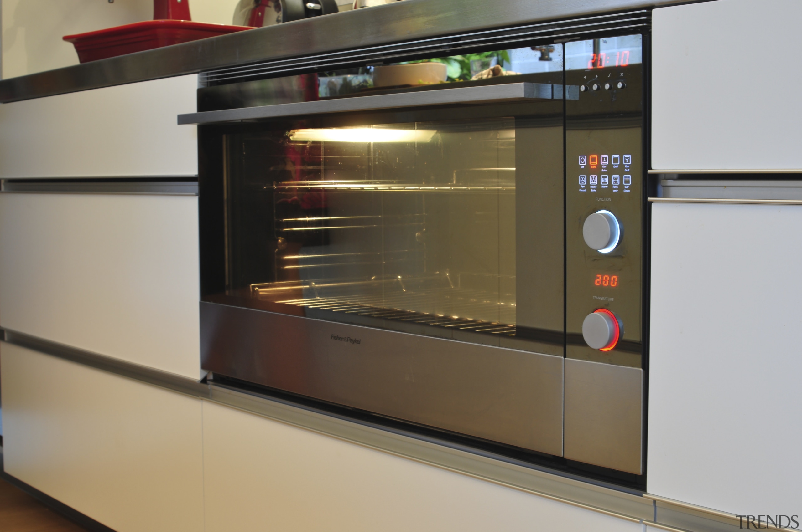 Kitchen by architect Gerrad Hall with F&amp;P appliances home appliance, kitchen appliance, microwave oven, oven, gray, brown