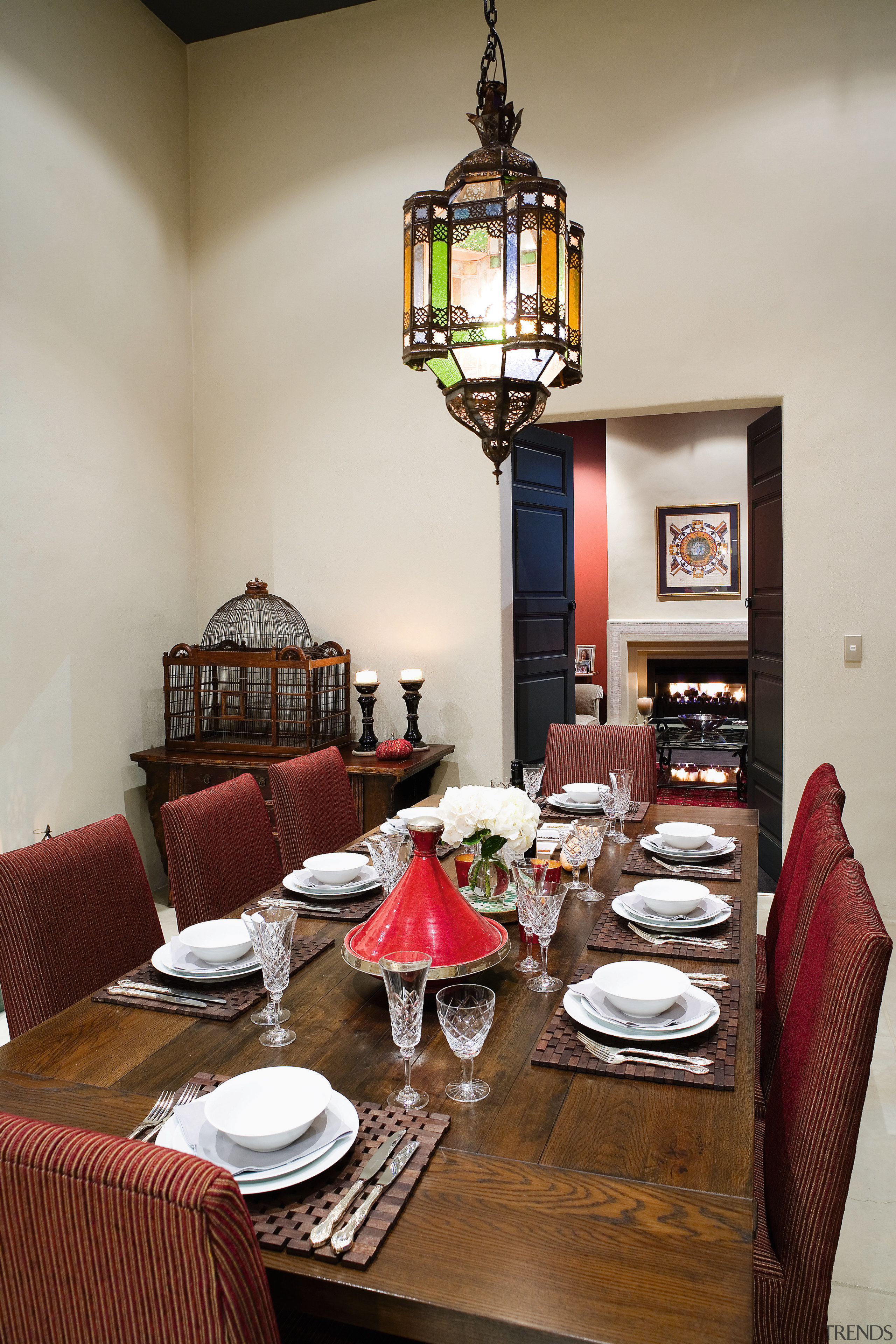 A view of a home interior designed by dining room, furniture, home, interior design, living room, restaurant, room, table, gray