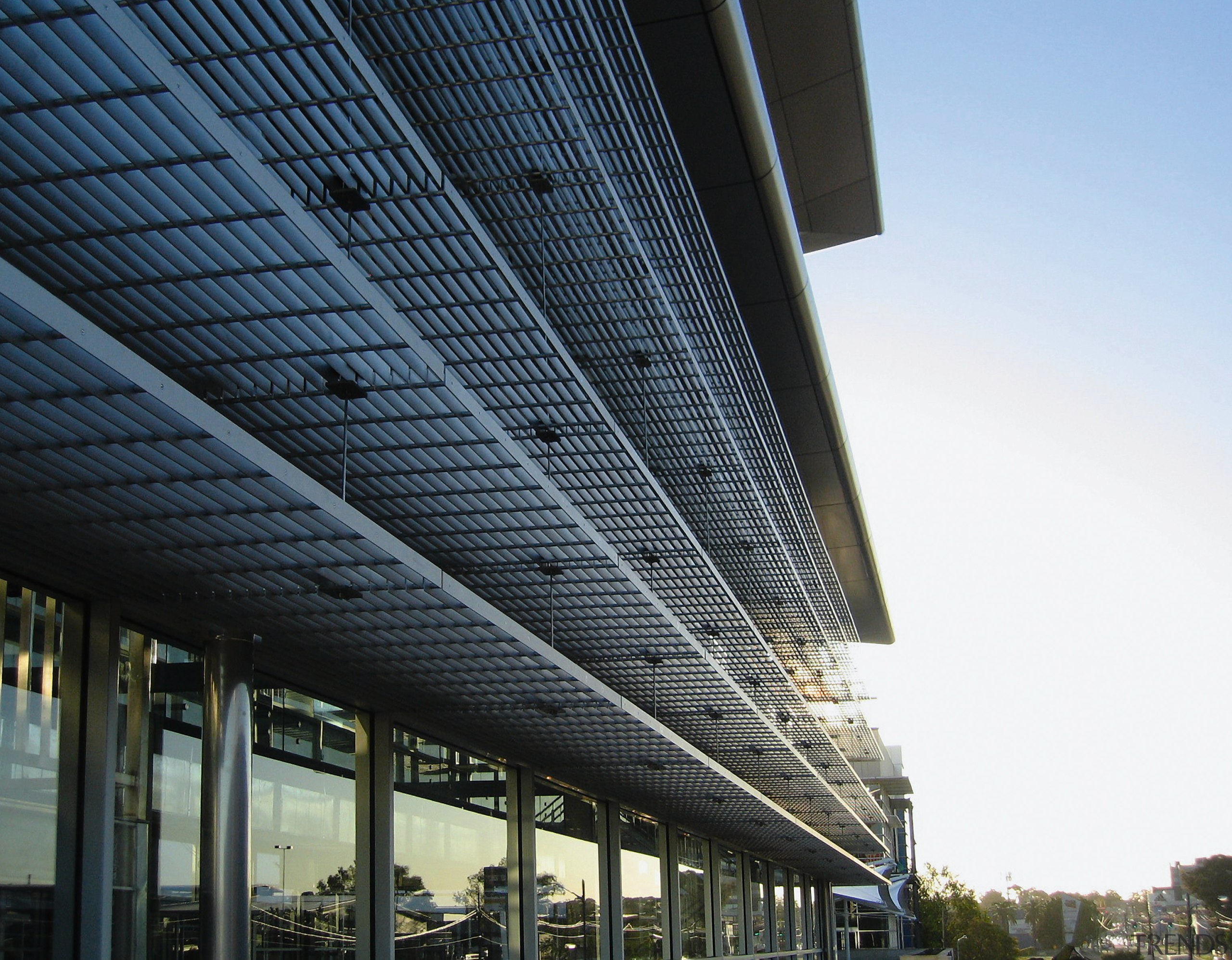 A view of the louvres/sunshades installed on the architecture, building, commercial building, convention center, corporate headquarters, daylighting, daytime, facade, headquarters, metropolis, metropolitan area, mixed use, sky, skyscraper, structure, tower block, urban area, black