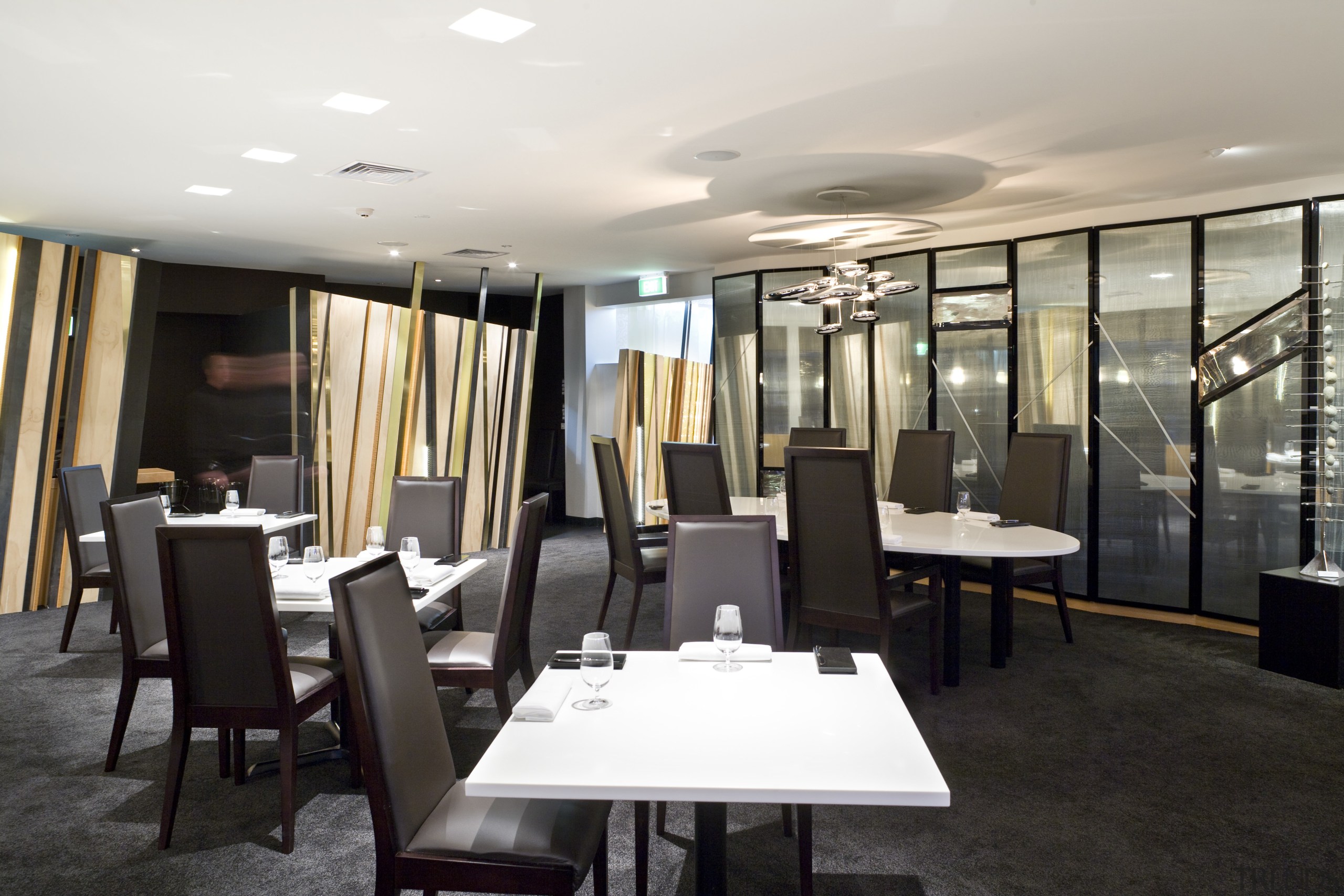 View of the main dining area of a ceiling, dining room, interior design, restaurant, table, white, black