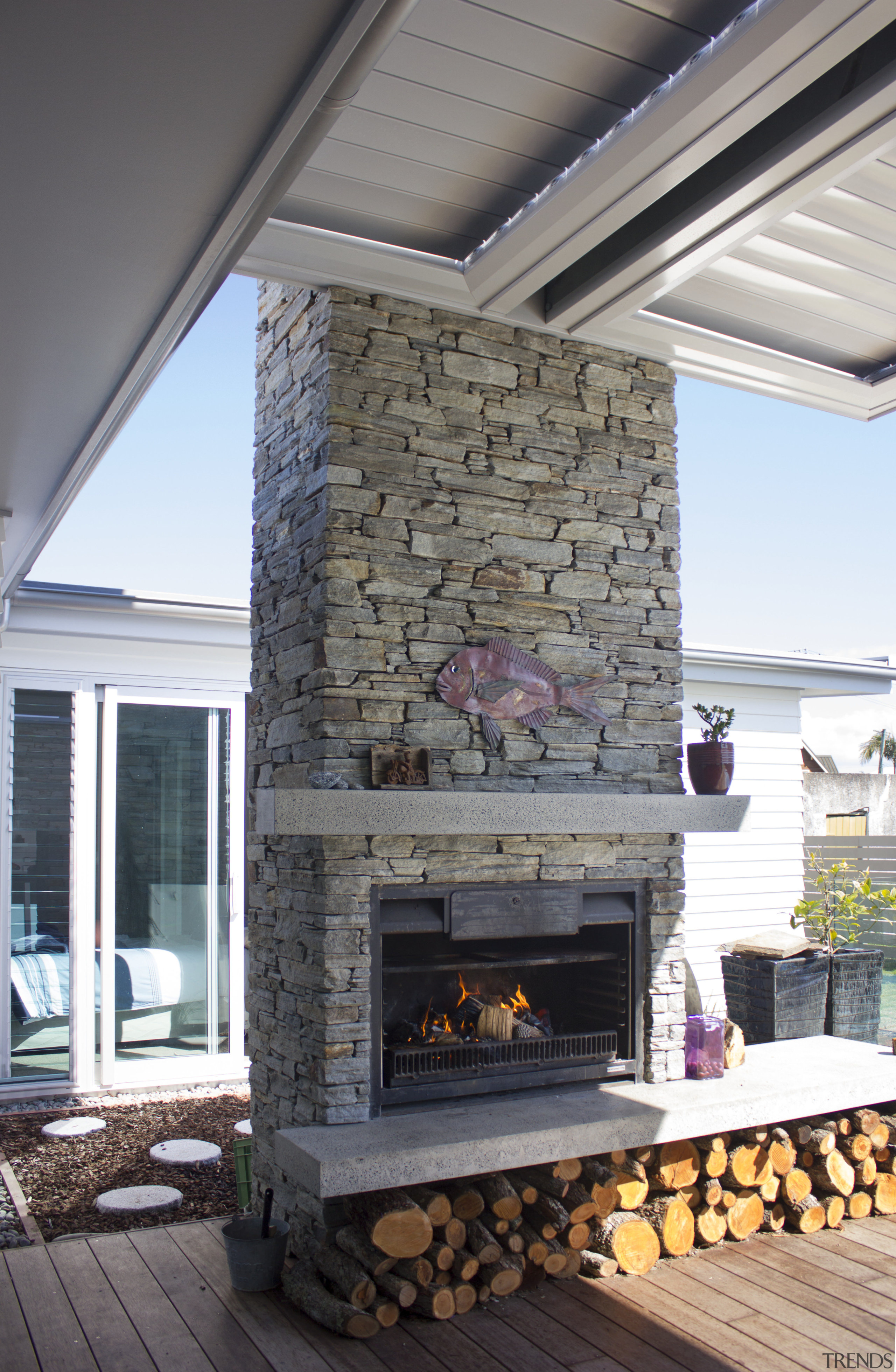 The experienced team at Fires by Design takes fireplace, hearth, gray, white