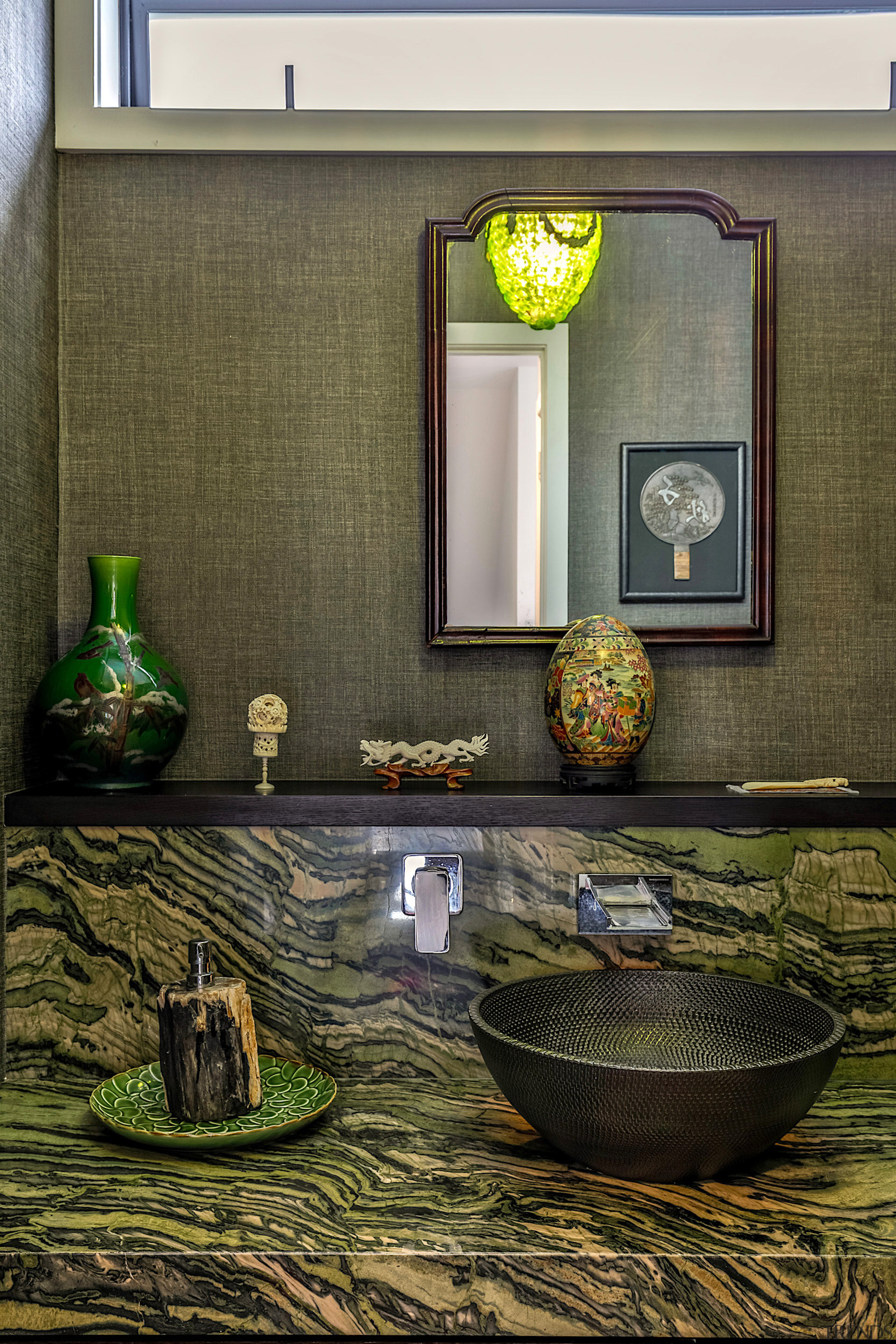 Luxurious bathroom vanity calling to mind the kitchen 