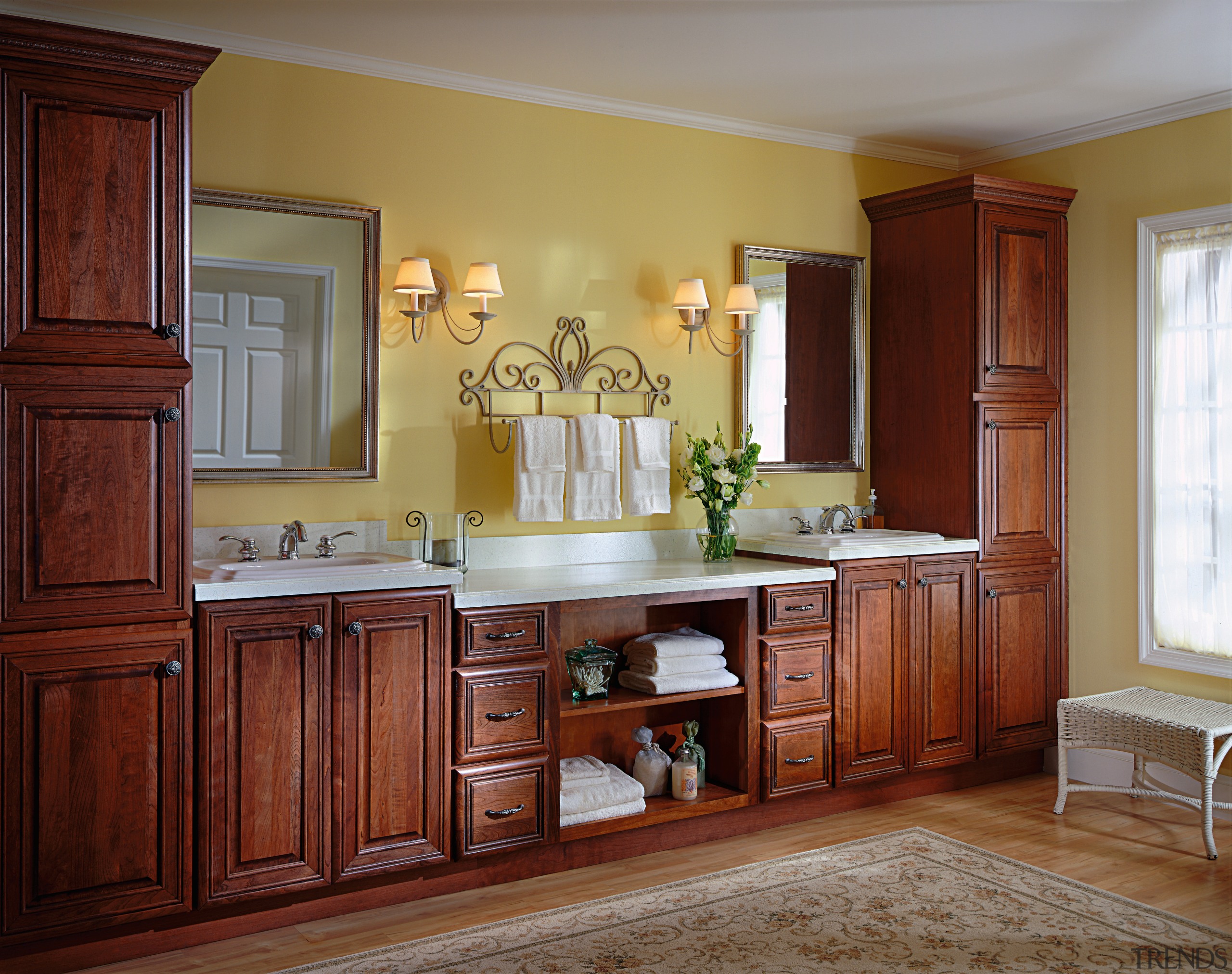 A view of these Luxury Bathrooms featuring stained cabinetry, chest of drawers, countertop, cuisine classique, floor, furniture, hardwood, home, interior design, kitchen, living room, room, wall, window, wood, wood stain, red, brown